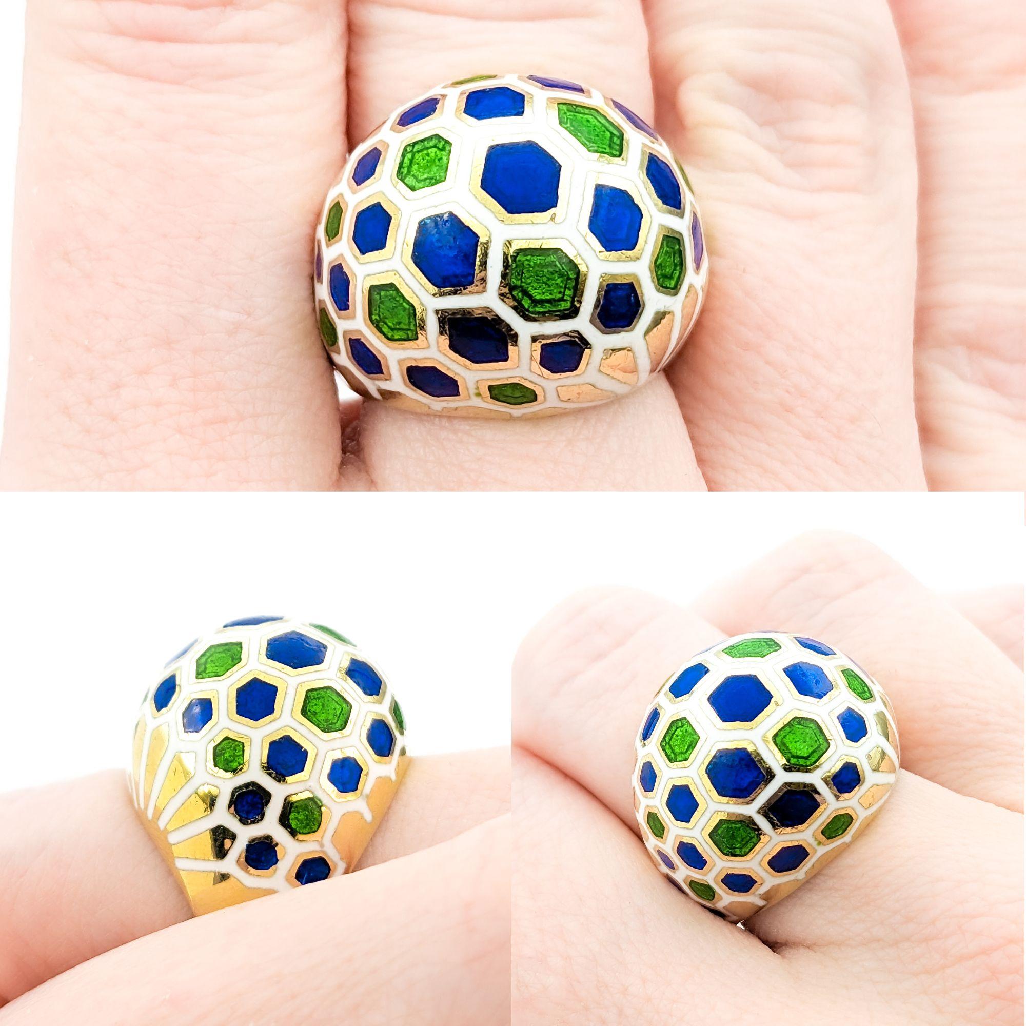 Unique Design With Enameled Hexagons Ring In Yellow Gold

This remarkable enamel ring, meticulously crafted in 18k yellow gold, showcases a unique design with enameled hexagons, presenting a modern take on geometric elegance. The enchanting
