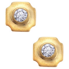 Borchie dorate con diamanti dal design unico