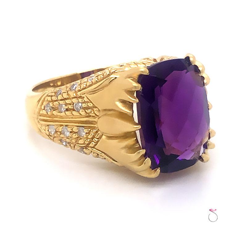 Beautiful designer large Amethyst and Diamond ring in 18k yellow gold. This unique ring features a cushion shape purple Amethyst center gemstone with checker faceting. The Amethyst measures approximately 14 mm x 9.00 mm with an estimated weight of