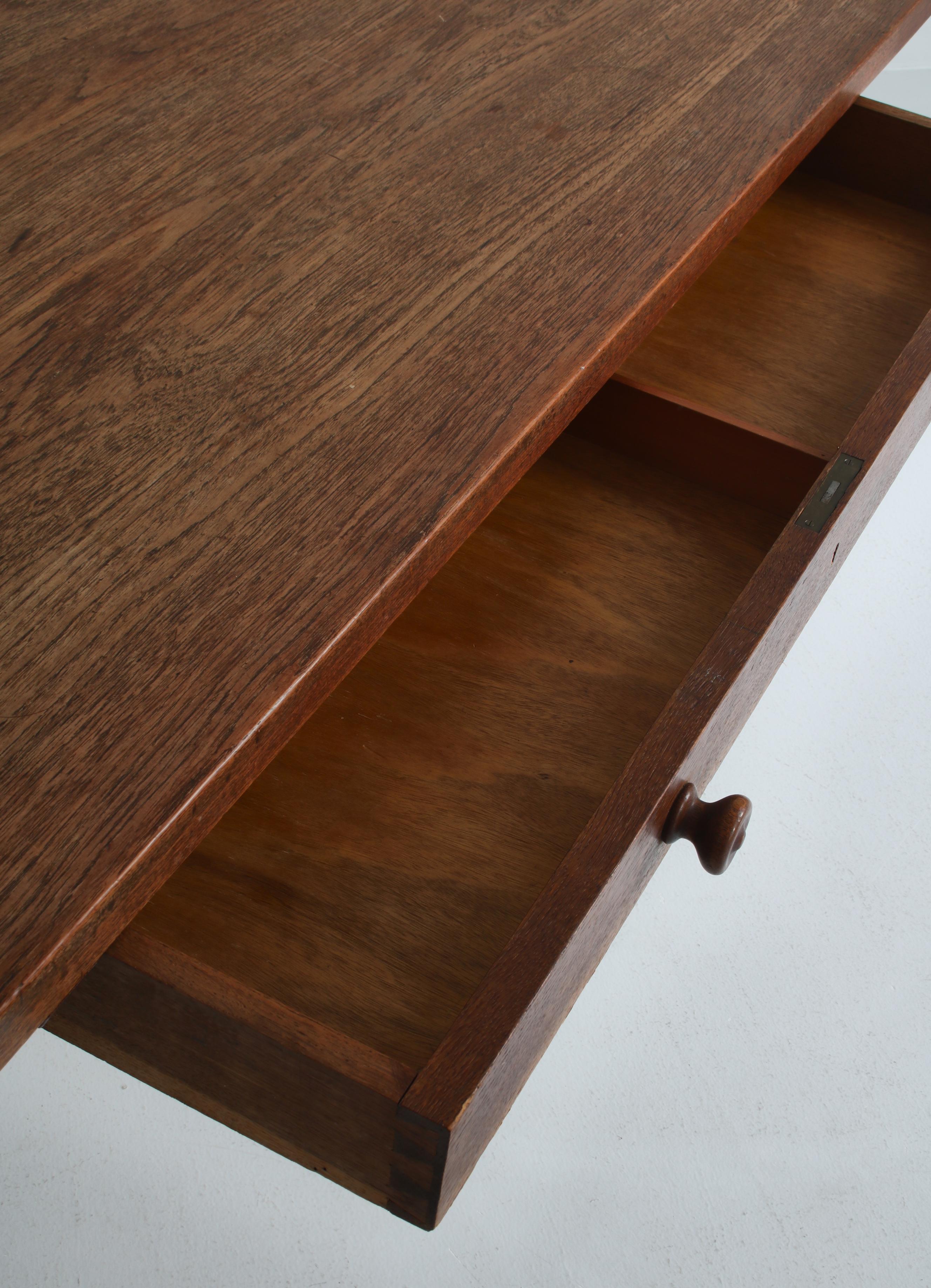 Fer Bureau ou table unique fabriqué par Jens Harald Quistgaard en 1953, en teck massif et chêne en vente