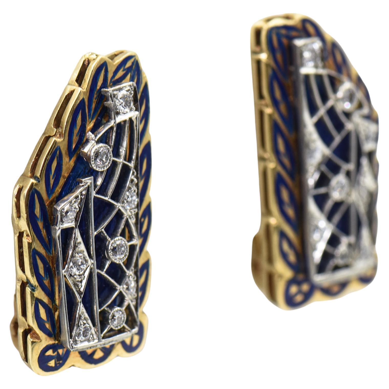 One of a kind custom made earrings that consist of a marriage made in the 1950s of a filagree art deco diamond piece mounted on a blue enamel and 14k gold earring that resembles a leaf as well as has a leaf enamel design.  They have a lever back