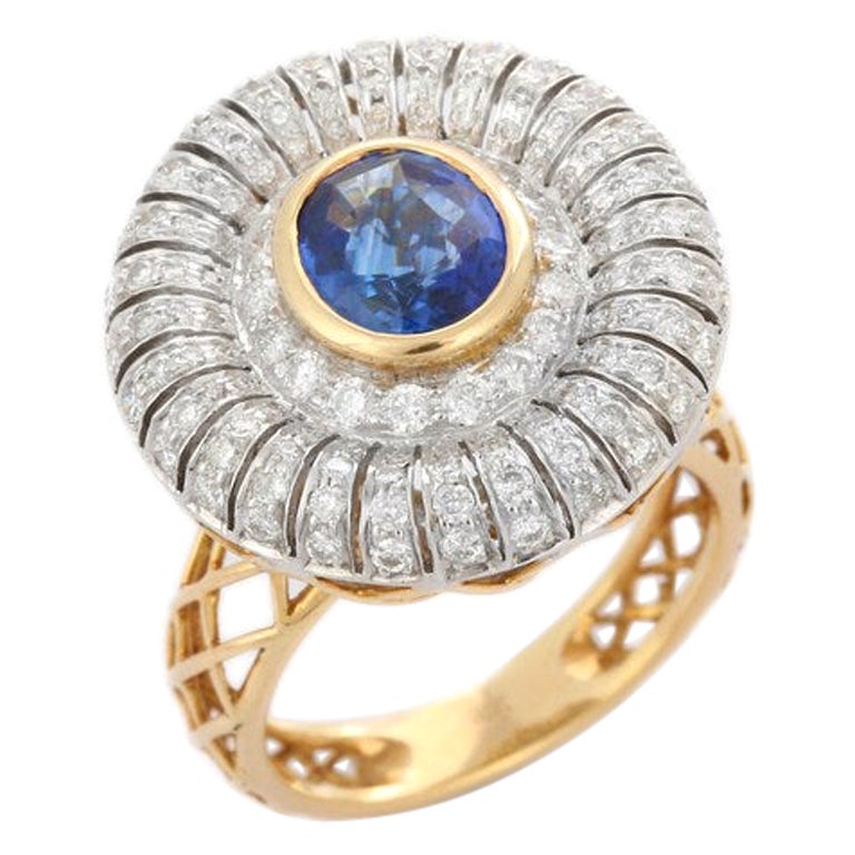 Einzigartiger Cocktailring aus 18 Karat massivem Gelbgold mit Diamanten und blauem Saphir ()