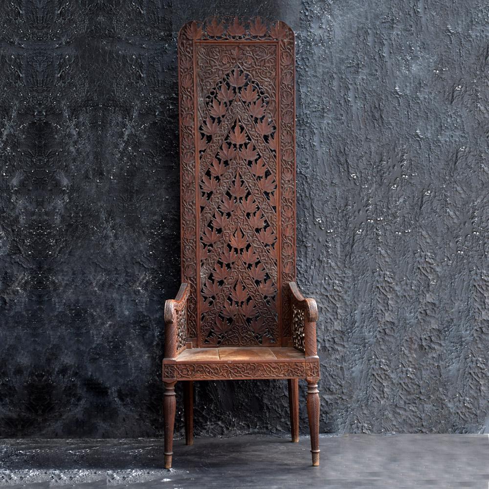 Unique early 20th century hand carved Rajasthani high back chair
We are proud to offer a unique and rare example of an early 20th century Rajasthan hand carved wooden chair. Extraordinary unusual and rare due to its high back form and detailed
