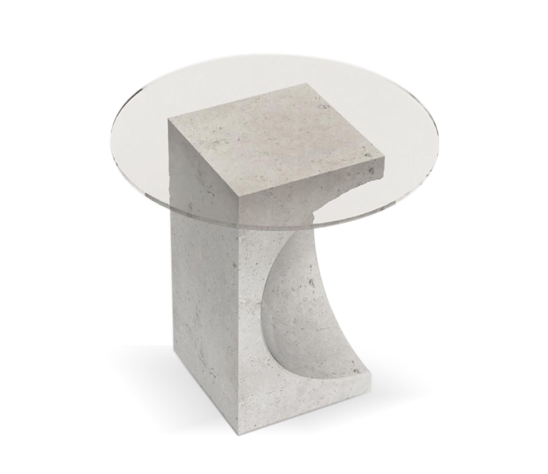 Unique edge side table by Collector
Dimensions: D 50 x H 50 cm
Materials: glass, travertino
Other materials available. 

The Collector brand aims to be part of the daily life by fusing furniture to our home routine and lifestyle, that’s why