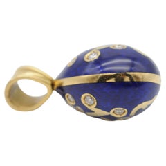 Unique egg pendant with diamonds, 18K yellow gold