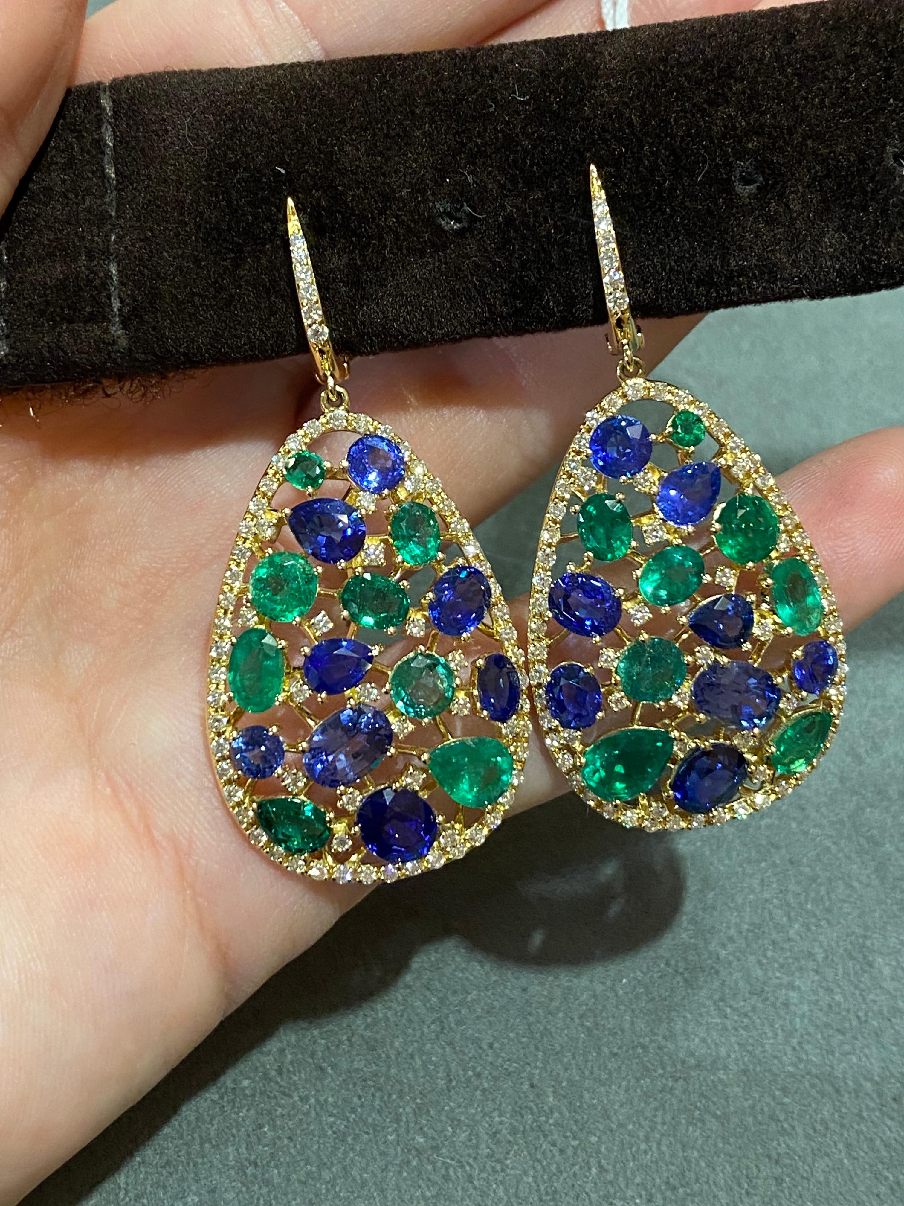 Earrings Yellow Gold 18K 

1.39 ct Diamonds
5.84 cts Emeralds
10.49 cts Sapphires
Weight 15,91 grams

With a heritage of ancient fine Swiss jewelry traditions, NATKINA is a Geneva-based jewelry brand that creates modern jewelry masterpieces suitable