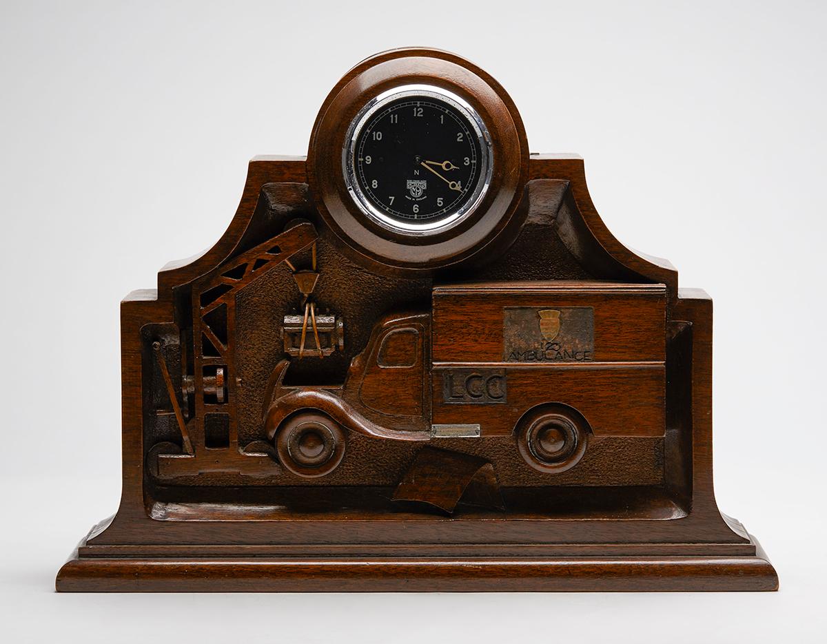 Hardwood Unique English WWII Carved Wood Ambulance Clock with Smiths Movement, circa 1943