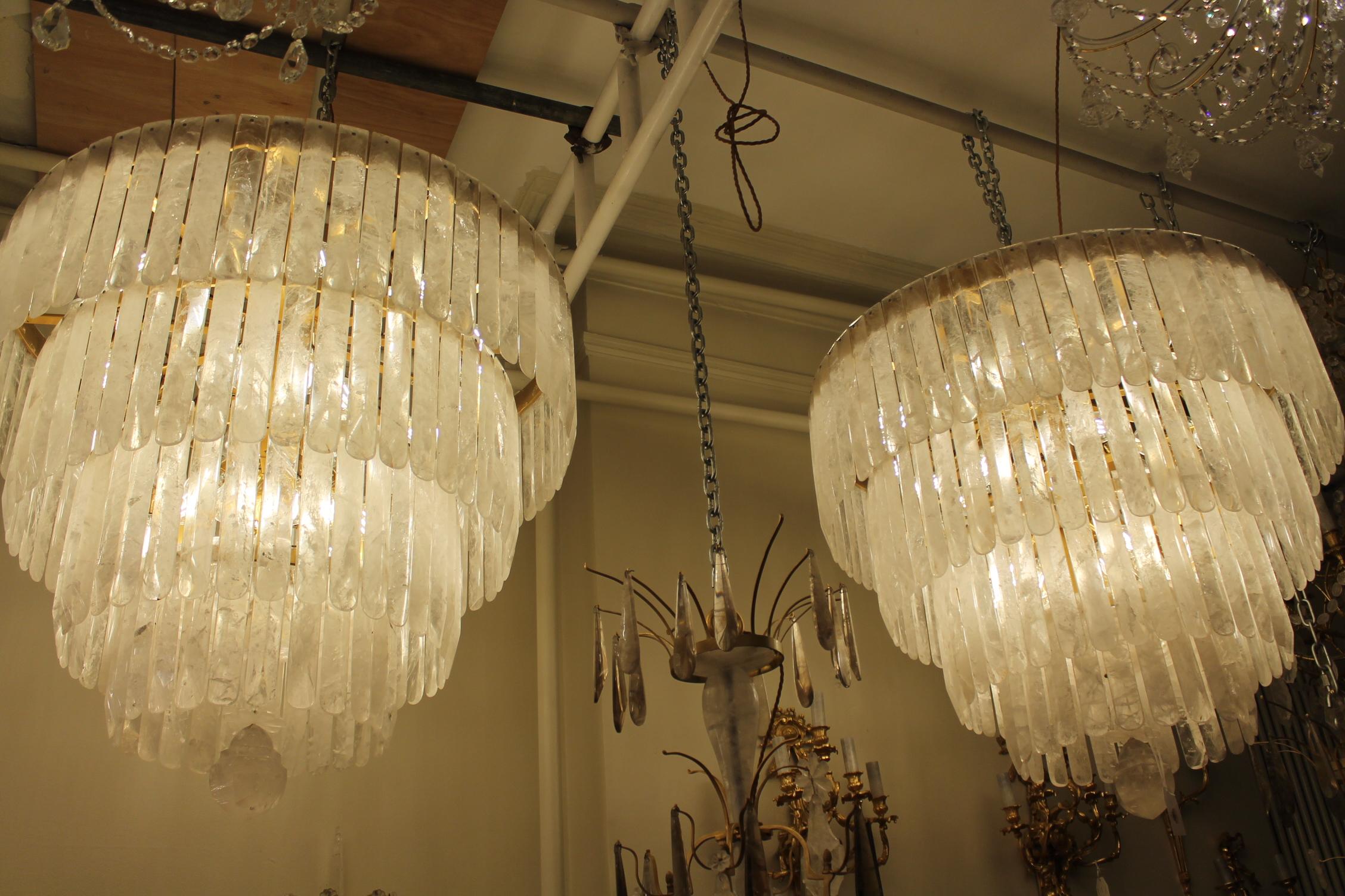 Rock Crystal Unique Exceptional pair of rock crystal chandeliers with four tiers sixty light For Sale
