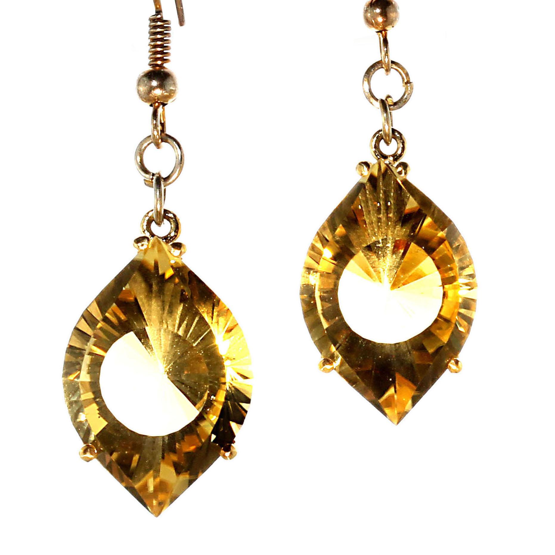 Sparkling fancy cut golden Citrines set in 14K Yellow gold dangling from 14K gold plated french wire earrings.  These amazing Citrines sparkle from every angle as they dance from your ears.  The gorgeous gemstones are 20x13MM.  The entire length of