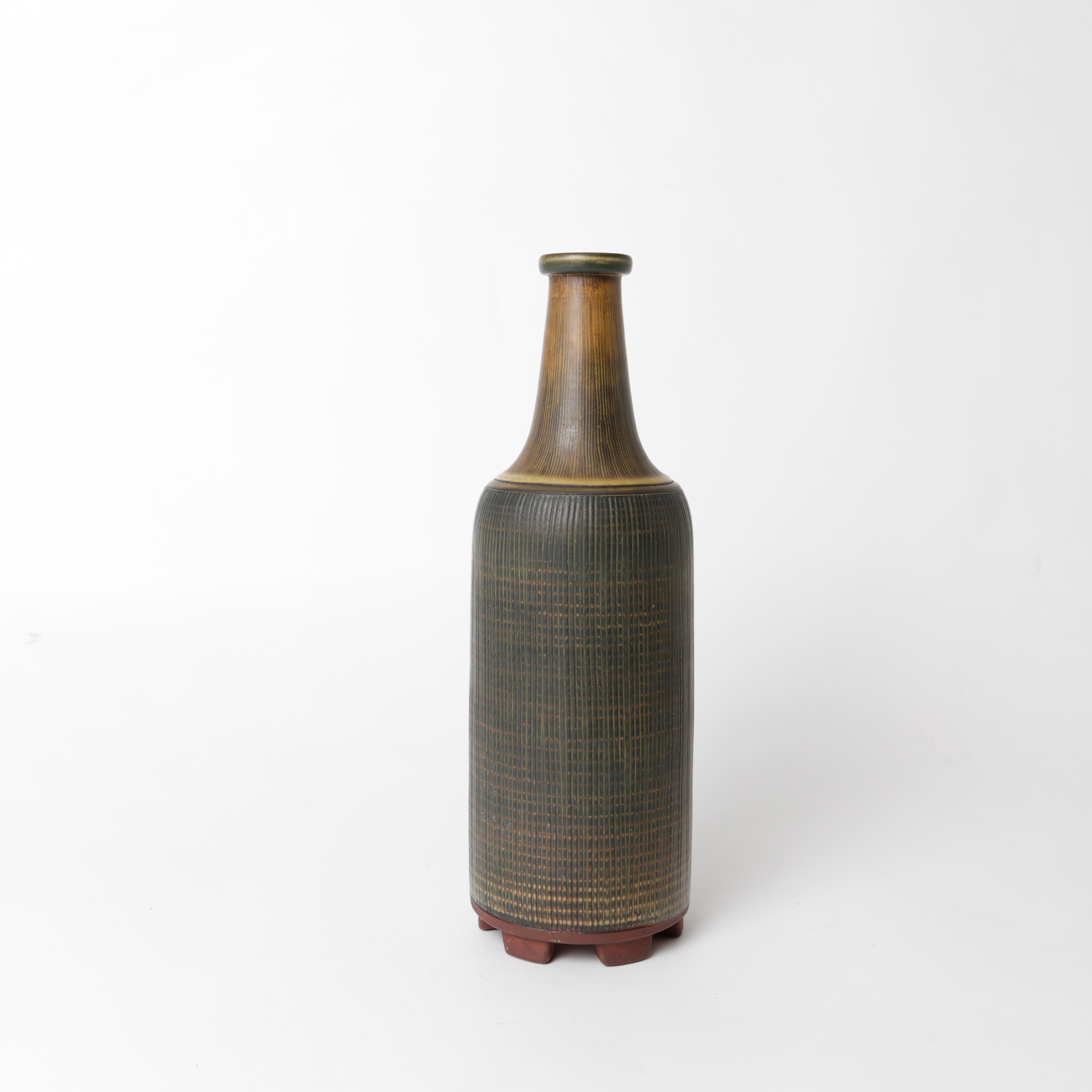 Unique Farsta stoneware vase by Wilhelm Kåge for Gustavsberg in 1956.
Measures: Height 34.5cm/13.6