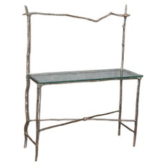 Table console unique de style Giacometti en bronze et verre imitation bois 