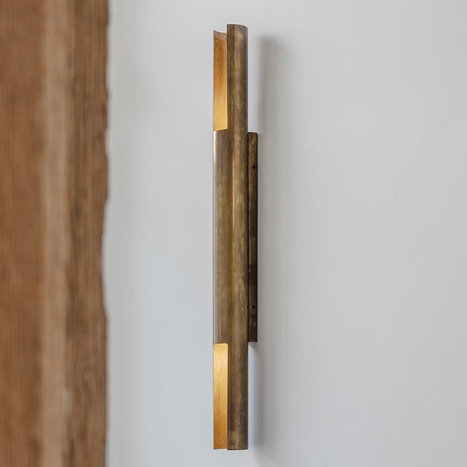 Unique Ferry wall lamp by Koen Van Guijze
Dimensions: 10 D x 120 H cm
Materials: Brass

Light inside a brutalist brass tube.

After a career of more than 25 years in the lighting business as a lighting architect, Koen van Guijze decided to