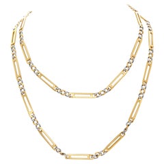 Unique Figaro link necklace in 18k. 36" length