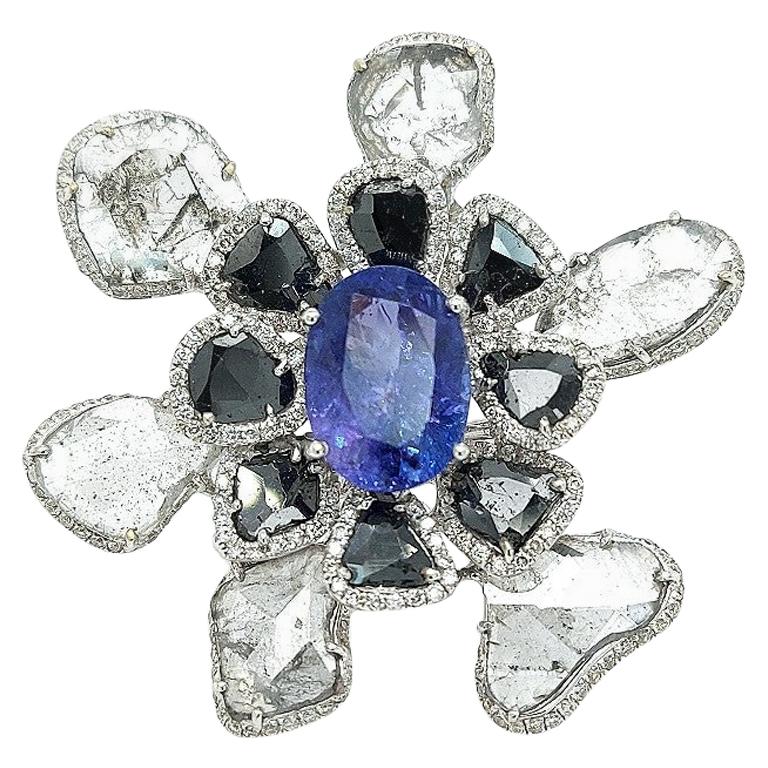 18kt White Gold Unique Flower Ring with Tanzanite, Black Grey and White Diamonds