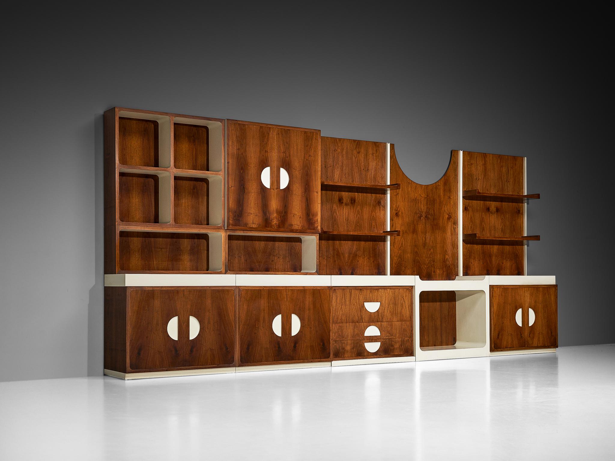 Franco Campo and Carlo Graffi for Home, bespoke wall unit, walnut, lacquered wood, Italy, 1960s

This wall unit captures a real slice of 1960s Italian modernism. Designed by Franco Campo and Carlo Graffi for their own label, Home, it reflects the