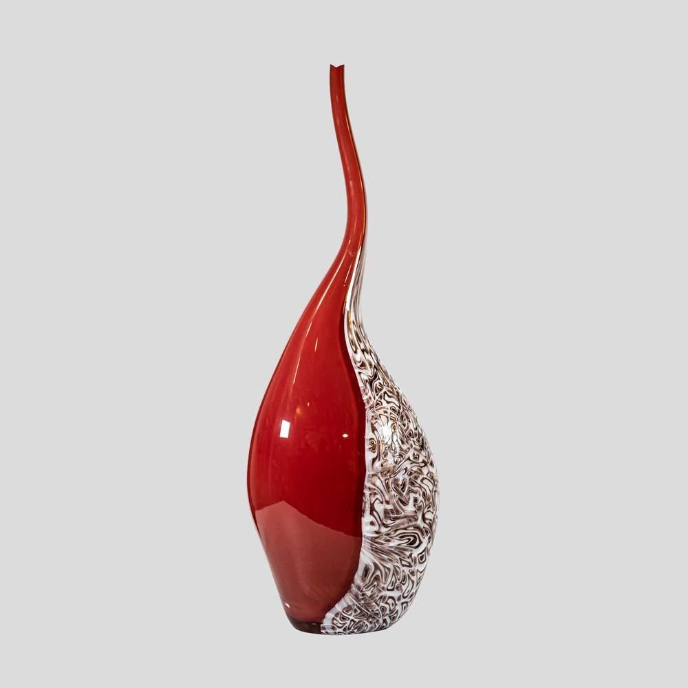 Unique free form blown glass sculpture

This is an unique art vase that showcases the exceptional craftsmanship of Murano glass and in particular the brilliant skills of Master Davide DONA.
This vase is intricately handcrafted using multiple
