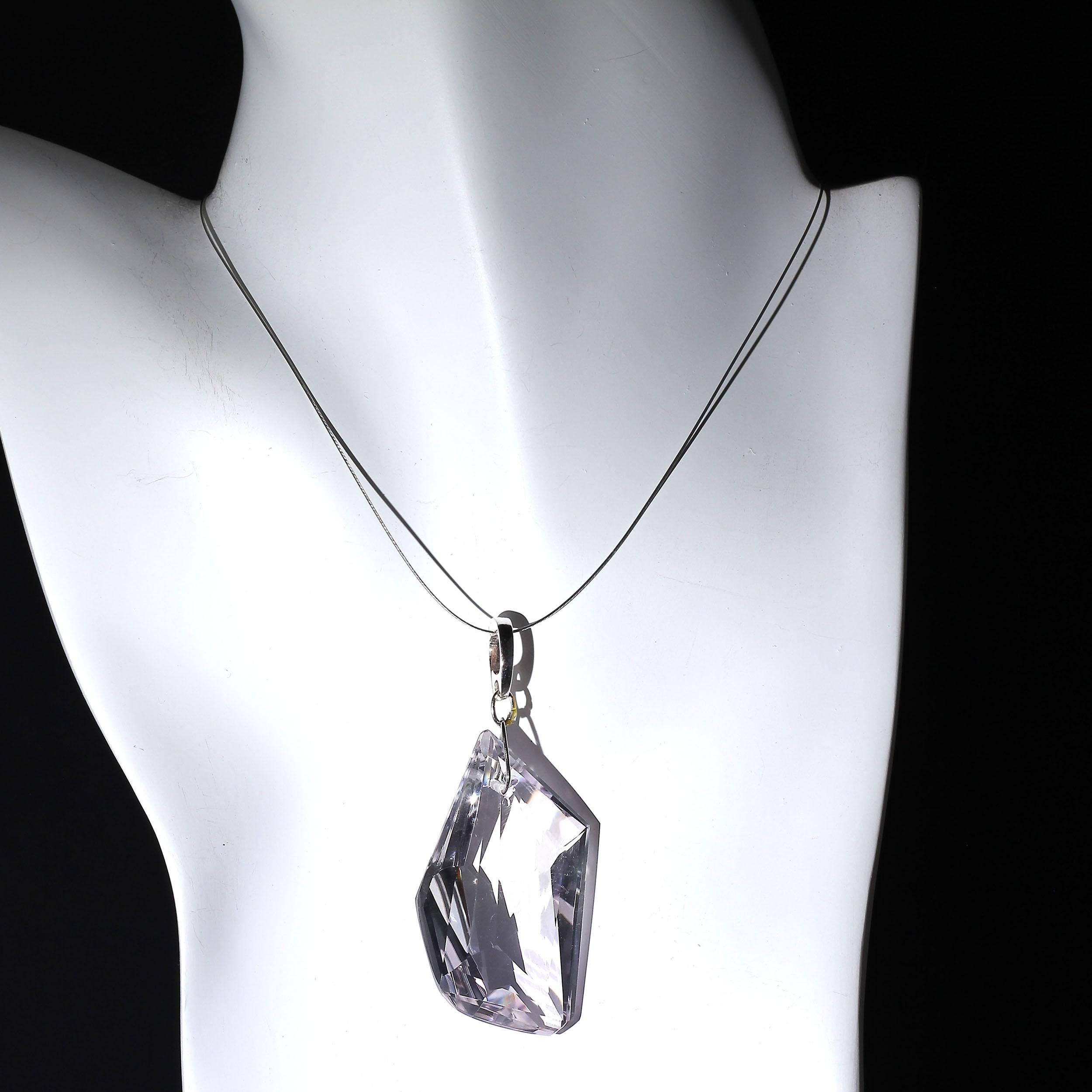 Just under 100 Carats of Brazilian Rose of France ( soft lilac Quartz) Crystal Pendant faceted in a unique free form shape. It has just the slightest tinge of purple tone. Leave it to the Brazilians to fashion such a beautiful pendant from one of