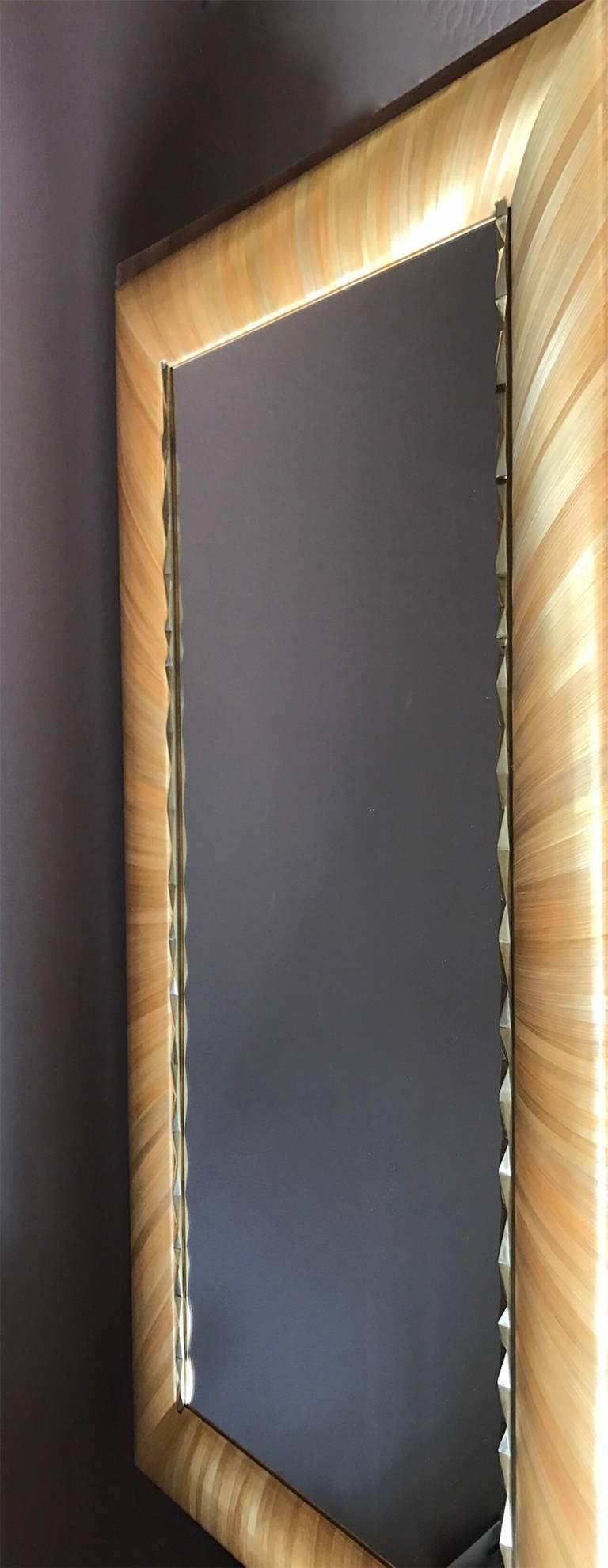 Unique French brass and straw marquetry mirror made in shiny polished brass and embossed golden straw marquetry in a radiant design style.
Wonderful four hands creation with Atelier R.E.