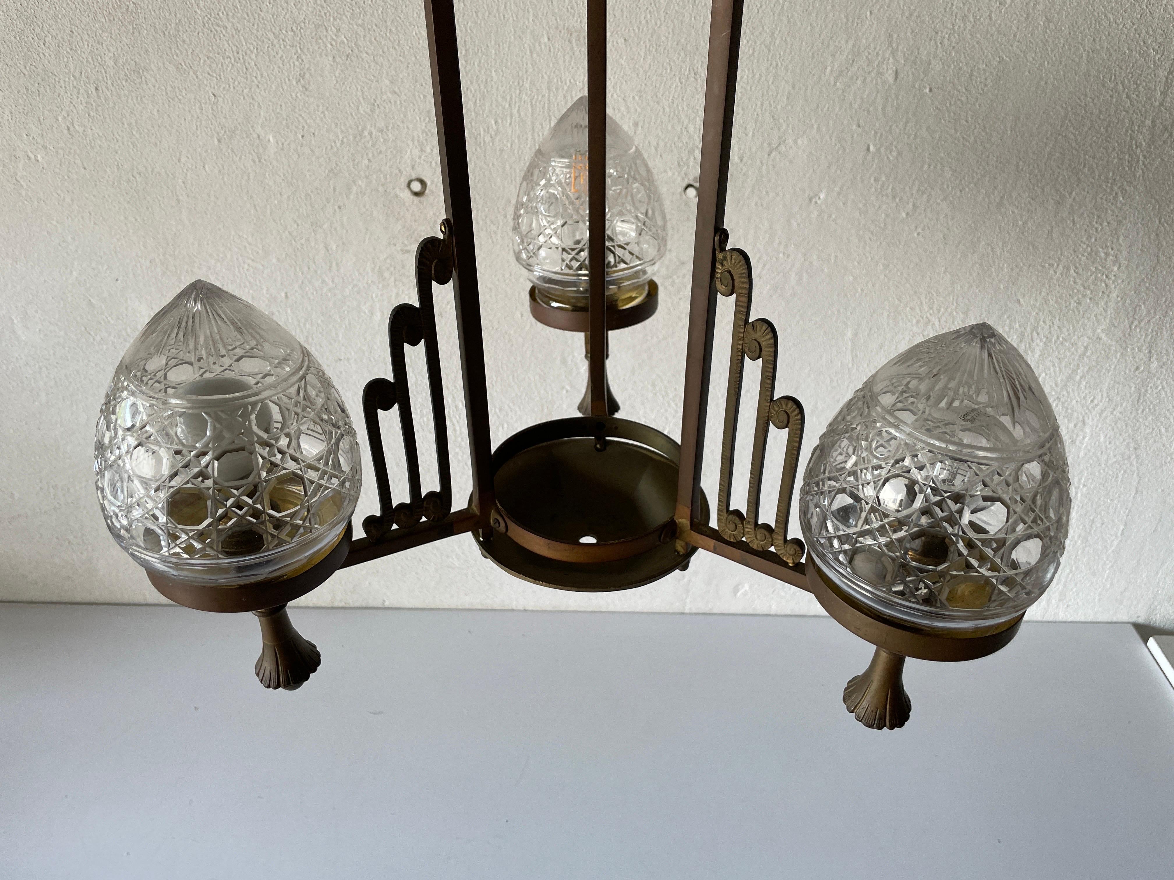 Unique French copper Architectural body chandelier, 1940s, France

Elegant design hanging lamp

Lampshade is in good condition and very clean. 
This lamp works with 3x B22 French light bulb. Max 100W
Wired and suitable to use with 220V and