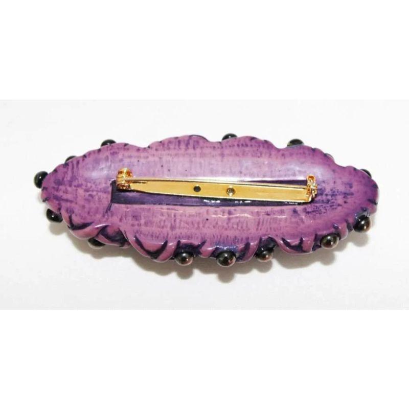 Unique french vintage purple brooch from the 80s, made of purple resin.

Size : 7.5  x 4  cm – 3  x 1.6  in.
Excellent vintage condition. 
Not signed, just unique !!!
