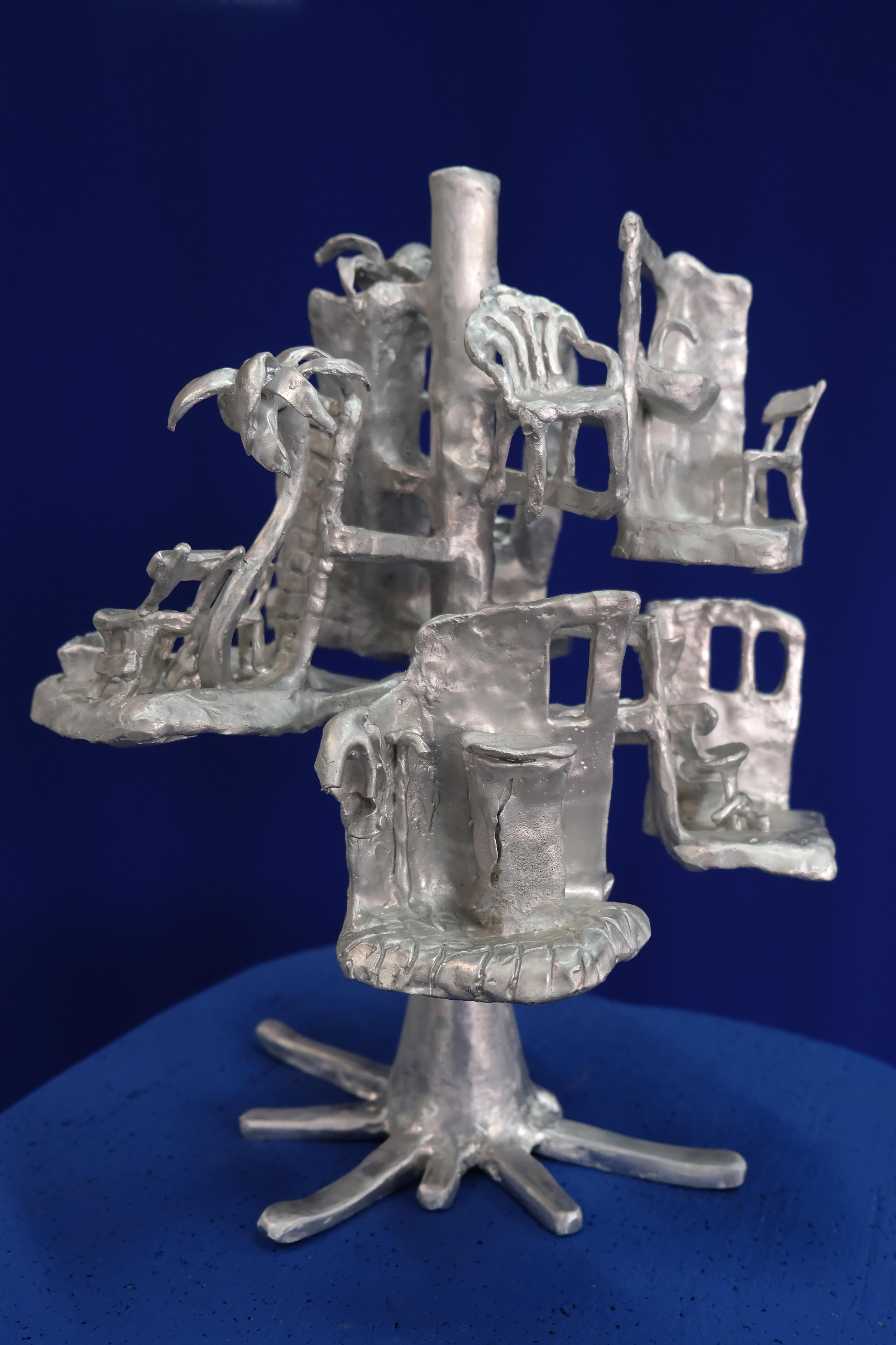 Handmade Aluminium cast Sculptural Candle holder depicting 