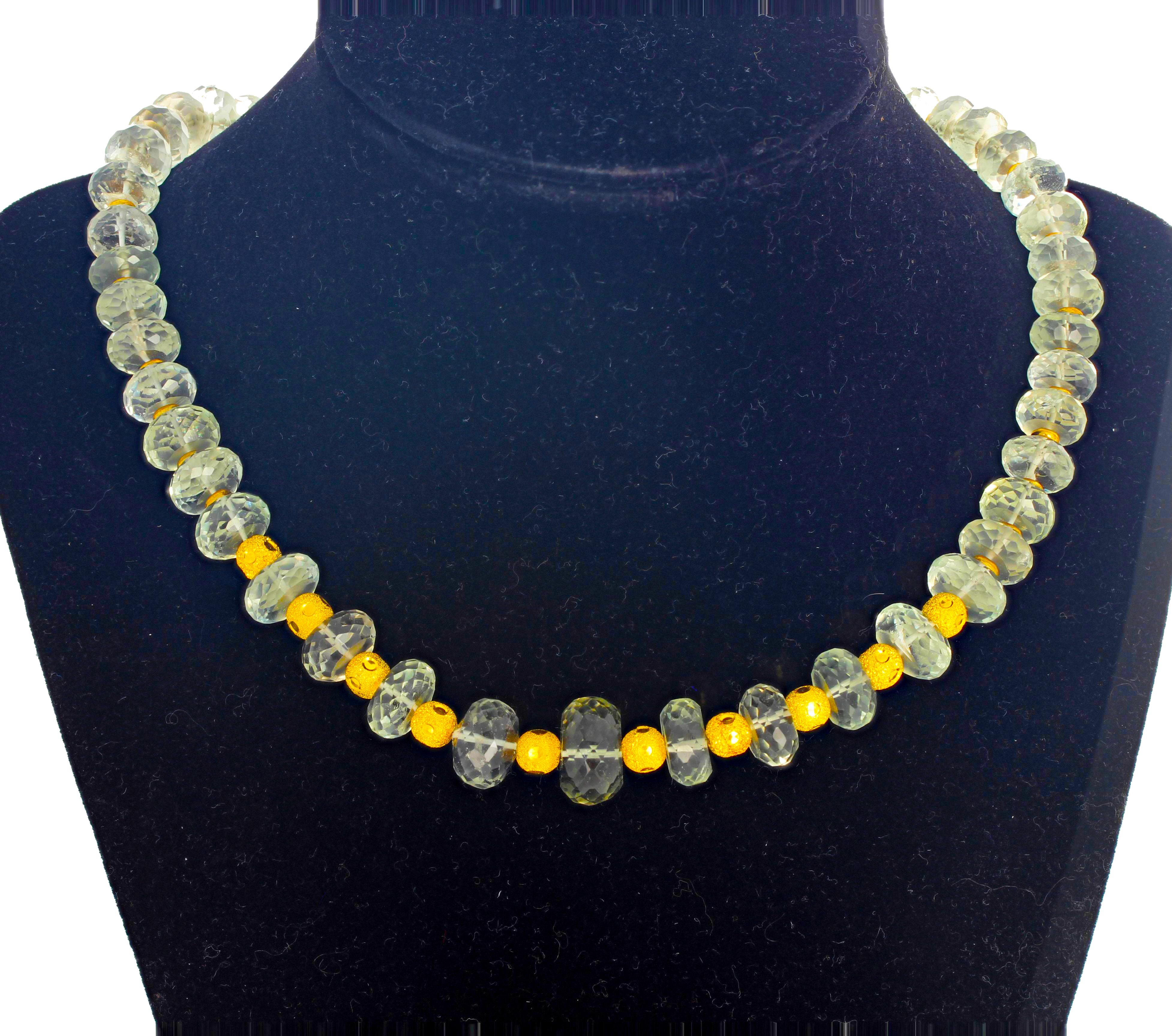 Checkerboard gemcut glittering brilliant pale green natural Praziolite Amethysts accented with gold plated sterling silver rondels set in this sparkling unique 16 inch long necklace with easy to use gold tone hook clasp.  The largest Praziolite is
