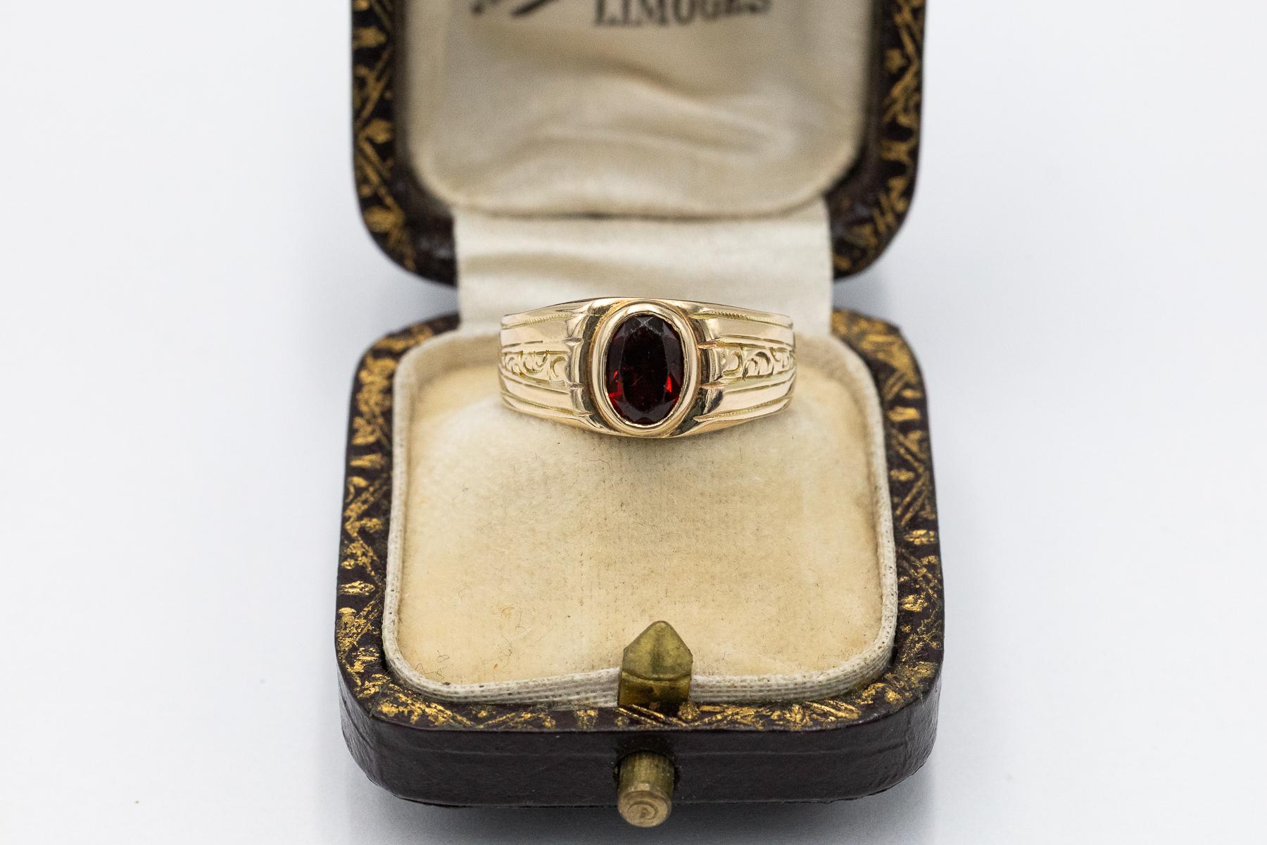 Art Nouveau Unique gold ring with a garnet, Austria, turn of the 19th/20th century. For Sale