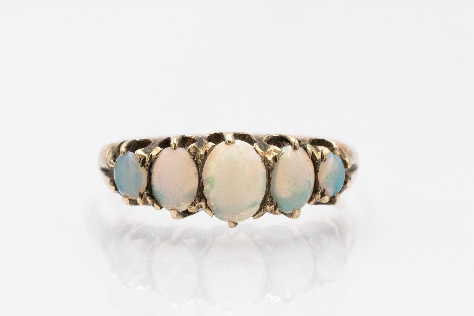 Antique gold ring with opals, Great Britain, late 19th century.

Made of 9-carat yellow gold (0.375 fineness)

Studded with five gradually increasing opals

Origin: Great Britain, Birmingham, 1897 - preserved hallmarks

Weight of the product: 2.4
