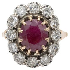 Unique gold ring with ruby and diamonds.