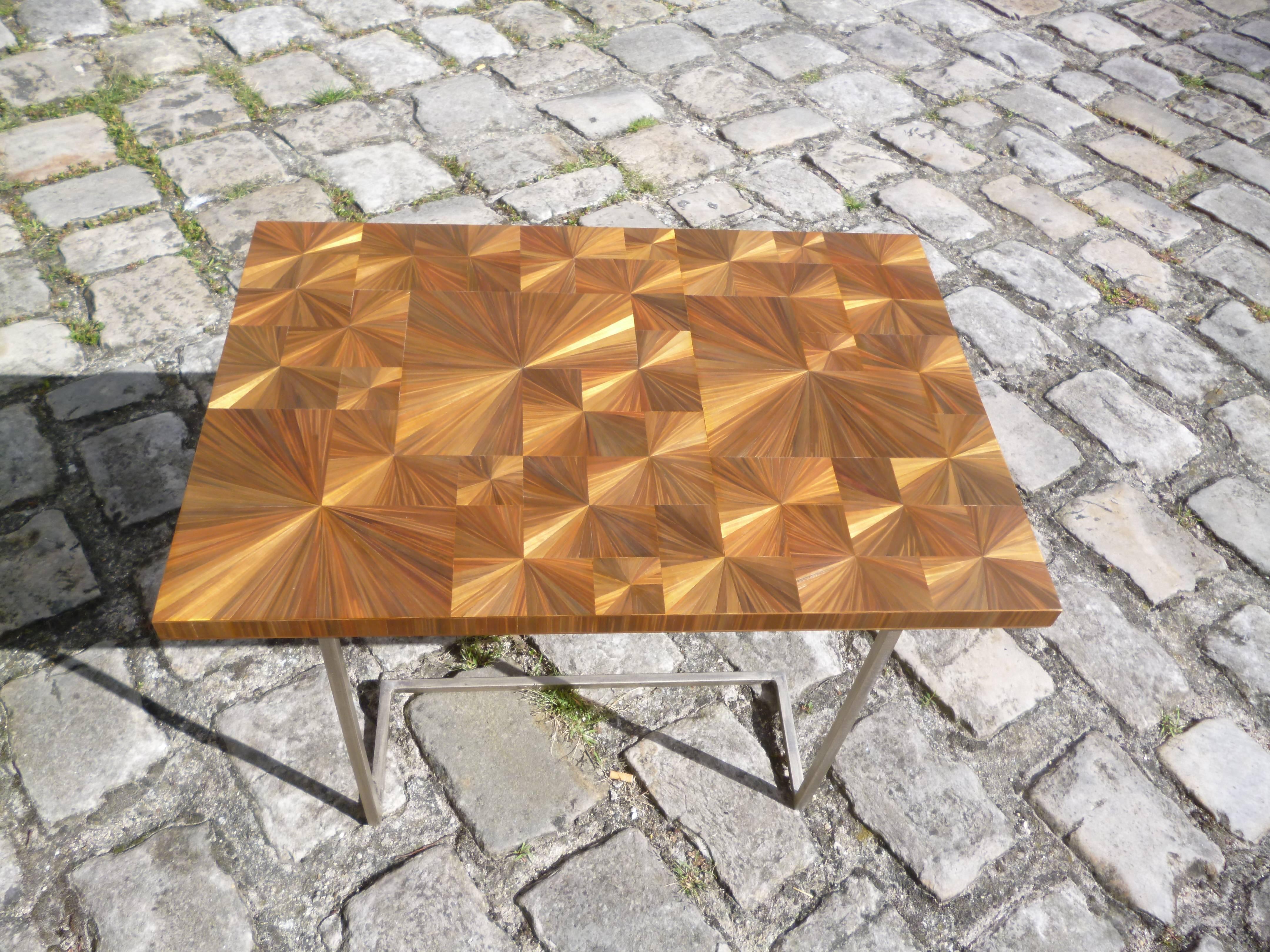 One of a kind golden coffee side table Sun, in stainless steel base and waxed gold straw marquetry totally handmade creation by the artist using ancient techniques.


Straw and marquetry, matter and technique:

As early as the 17th century