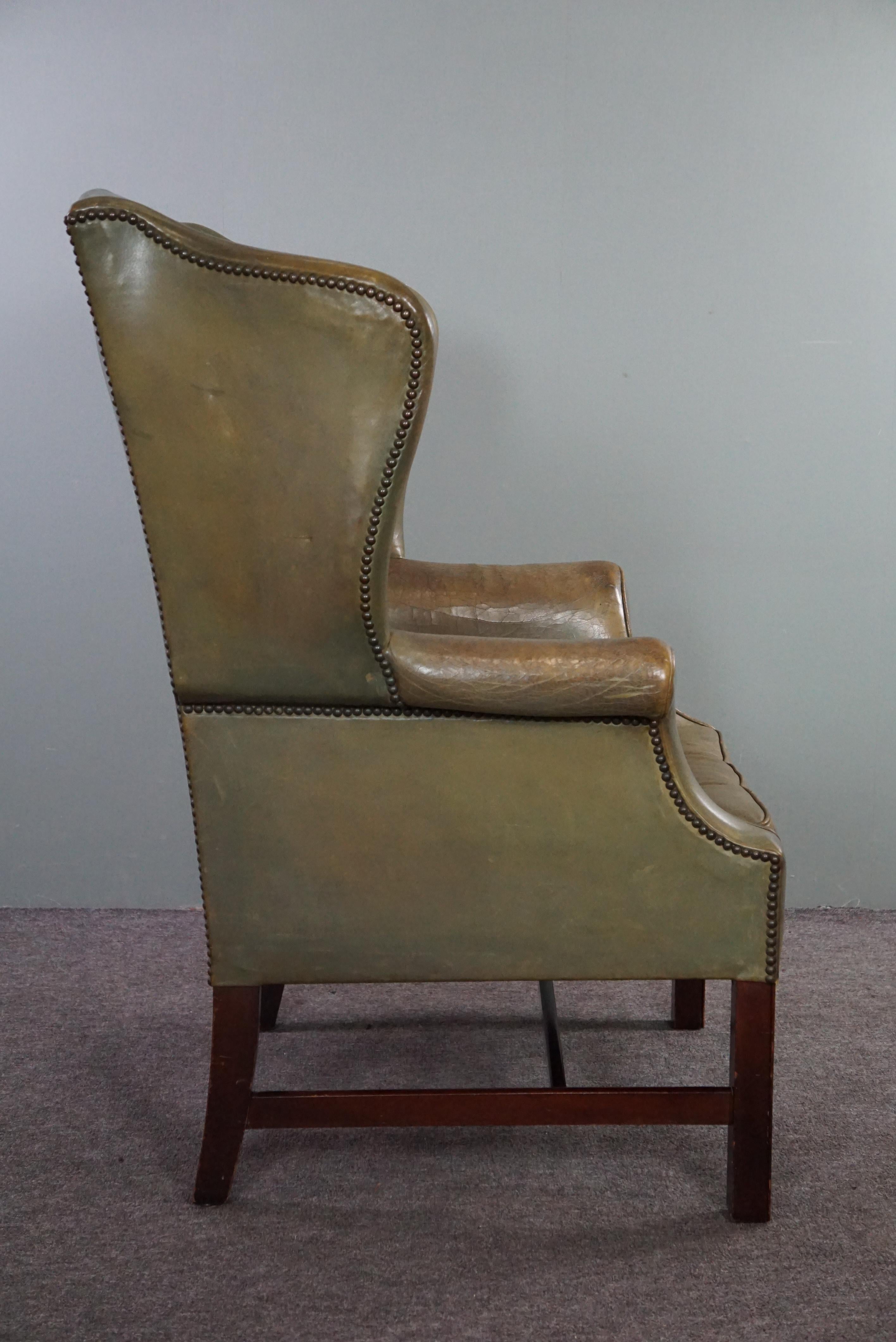 Hand-Crafted Unique green cowhide leather wing chair For Sale