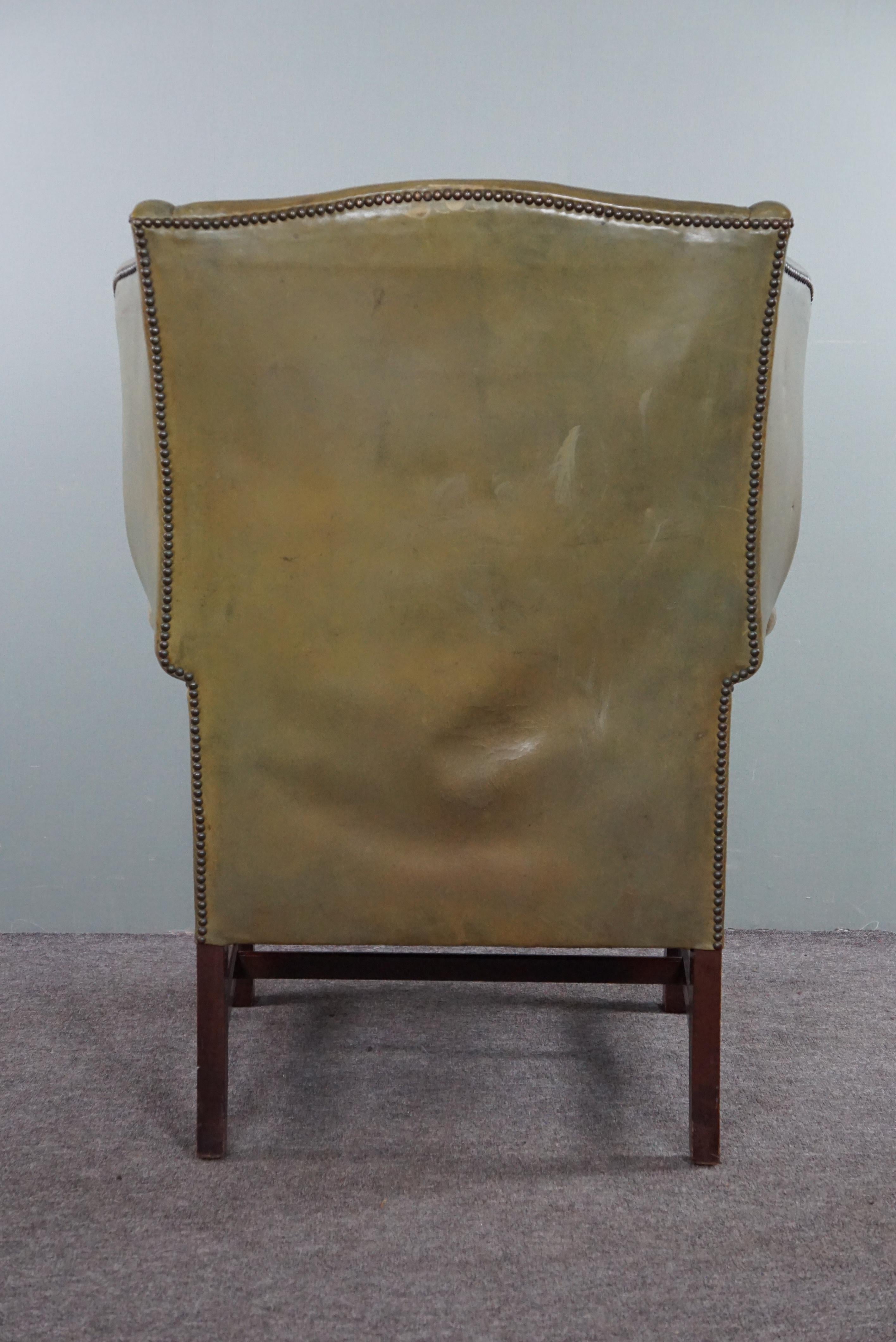 Unique green cowhide leather wing chair In Good Condition For Sale In Harderwijk, NL