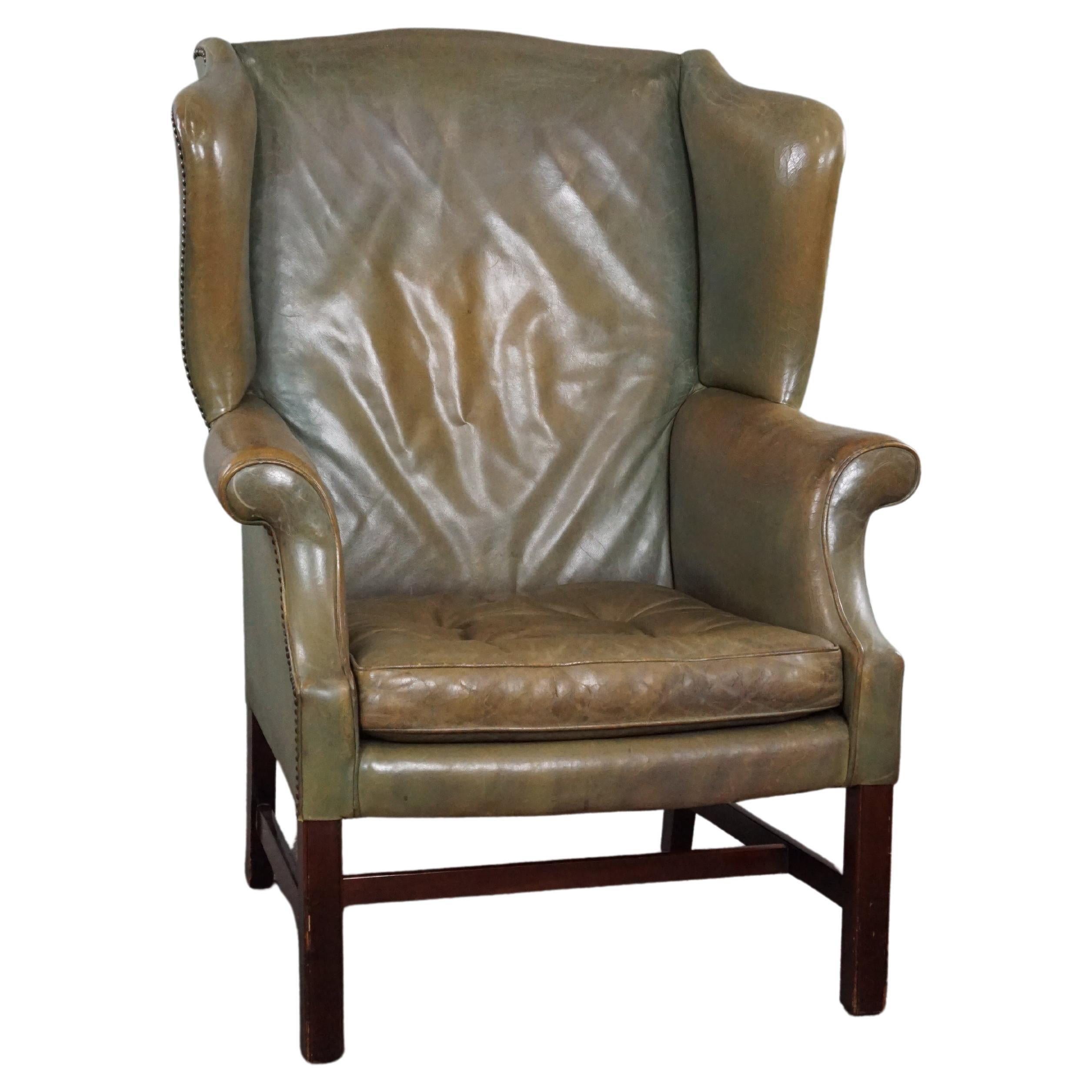 Unique green cowhide leather wing chair For Sale