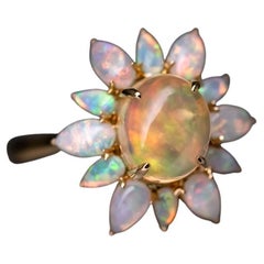 Bague de fiançailles 18 carats avec opale mexicaine de feu et opale australienne de conception unique