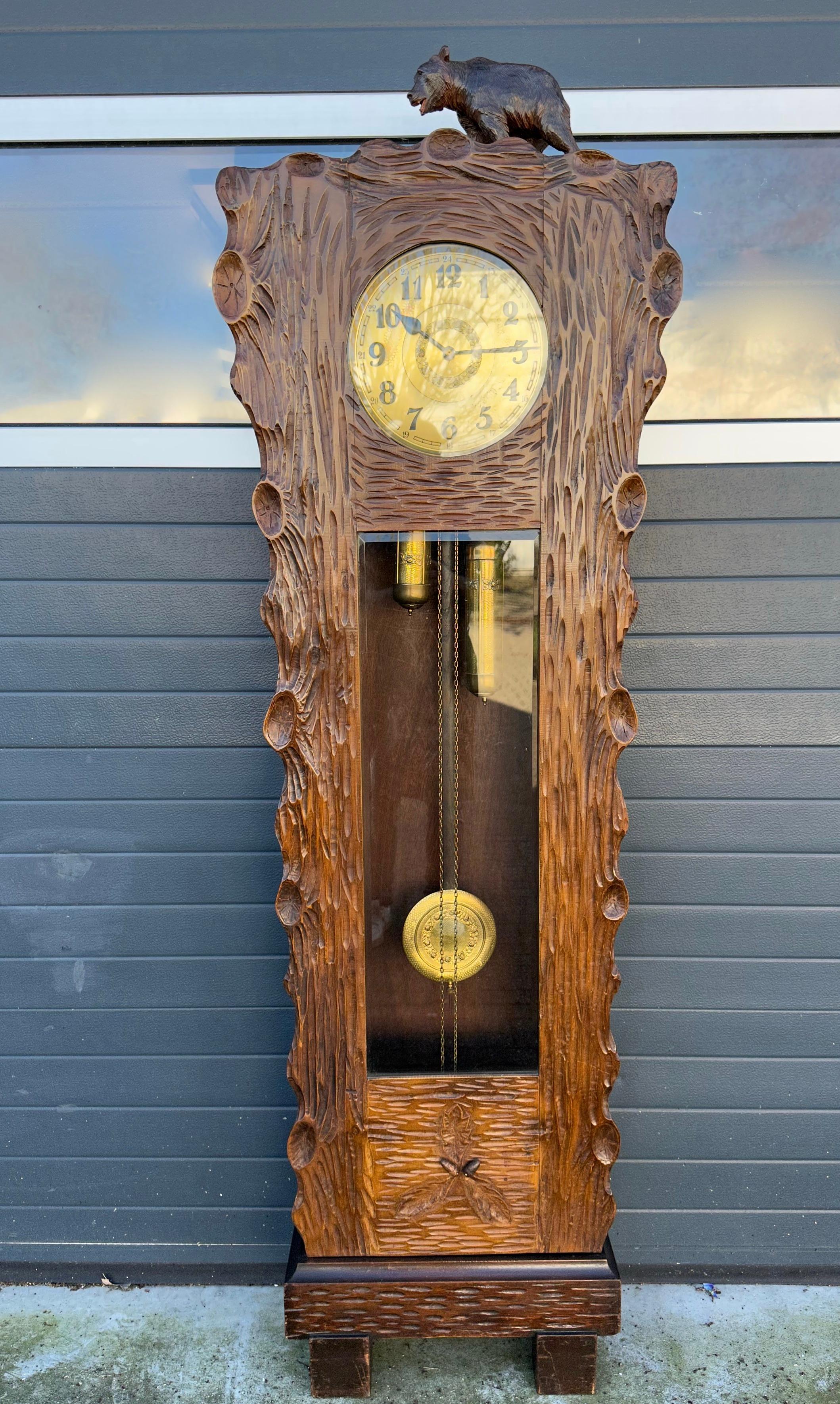 Stunning clock for the collectors of very rare and truly stylish Black Forest antiques.

Tree trunk design longcase or grandfather clocks are a rare find and this 6.5 feet tall specimen could hardly be in better condition. All handcrafted and hand