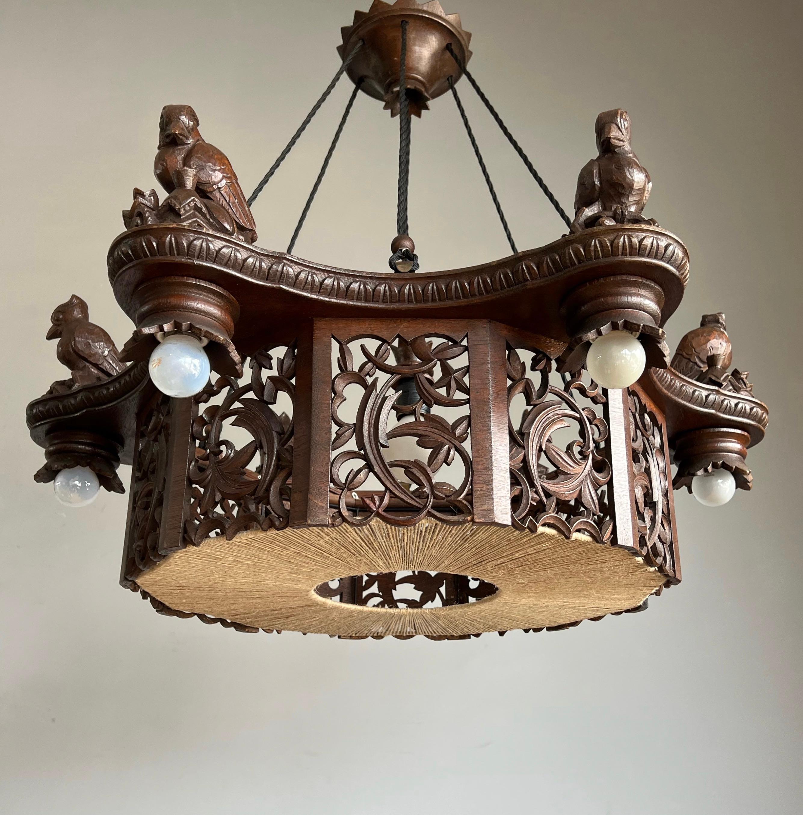 Antique and one of a kind, seven-light hand carved wooden stylish sculptural chandelier.

With early 20th century lighting being one of our specialities we always love finding pendants and chandeliers that we have never seen before and of which we