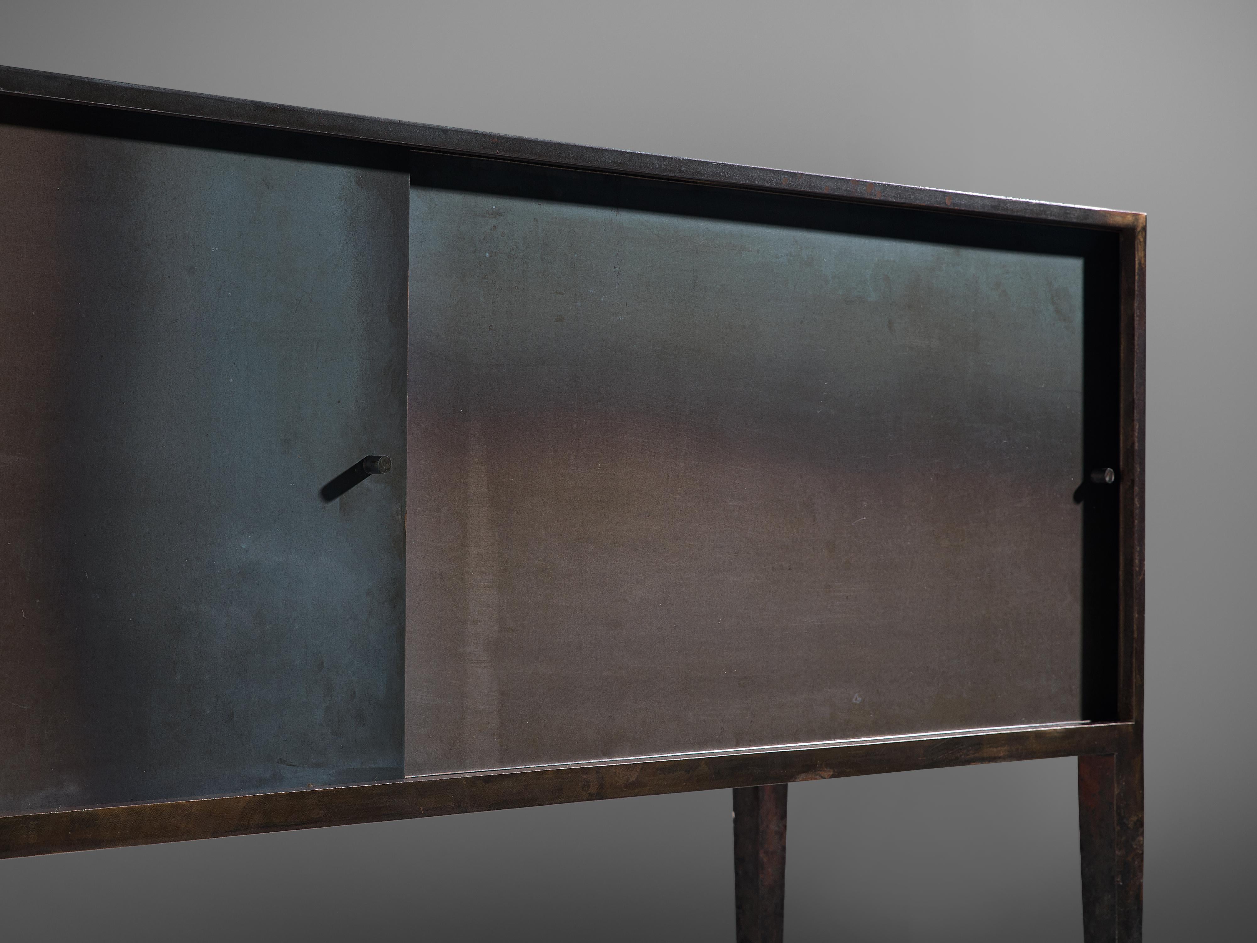 Idir Mecibah, sideboard, iron, Belgium, 2000

A handcrafted, sculptural sideboard forged by the Belgian artist Idir Mecibah (1958-2004). The smith, artist and furniture designer is known for his wrought iron pieces that show a certain Brutalist