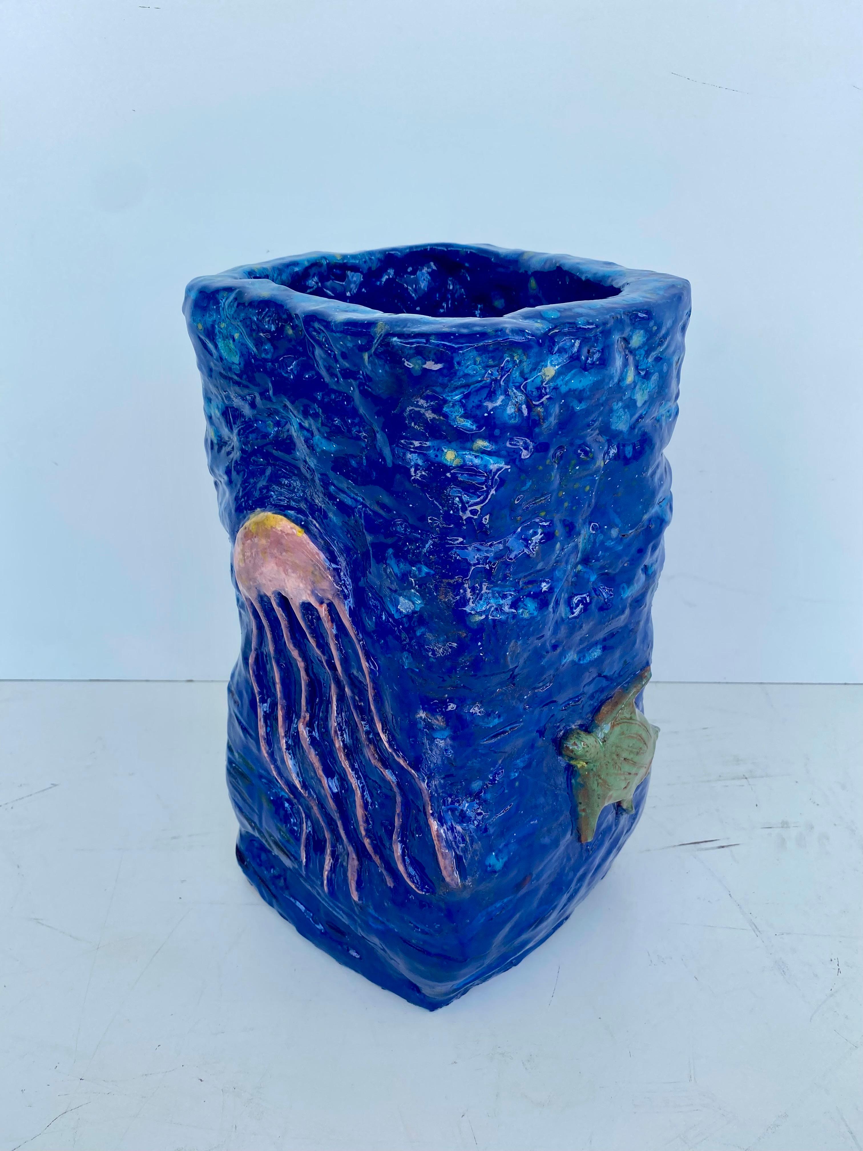Unique Hand-Made Sculptural Glazed Ceramic Umbrella Stand by Rexx Fischer 2024

Offered for sale is a hand-made ceramic umbrella stand that is signed and dated 2024 by Rexx Fischer. This colorful umbrella stand was inspired by the Florida Keys and