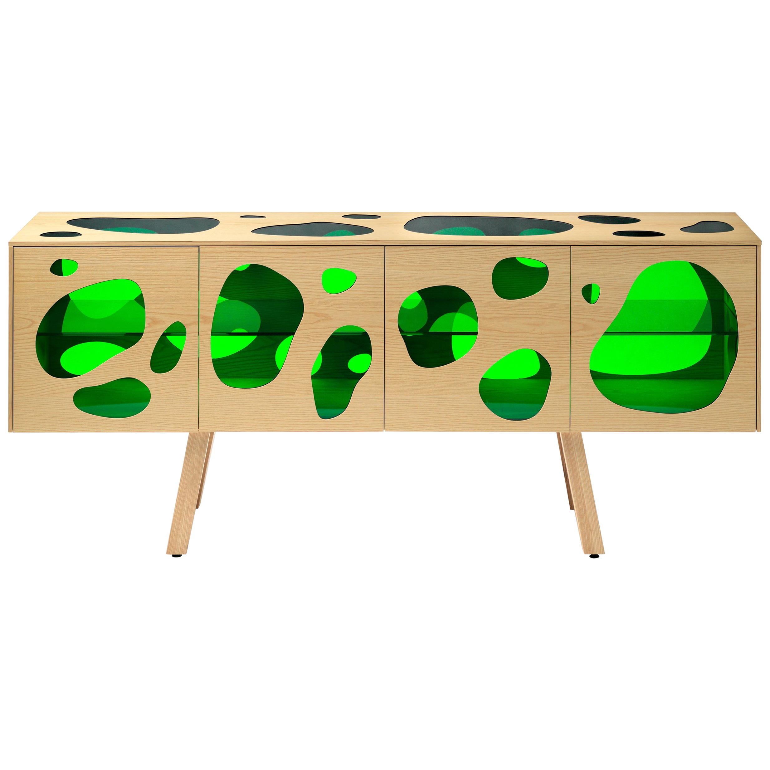 Prototype sideboard designed by Fernando and Humberto Campana in 2016.
This is the first piece ever made and is hand signed.
Manufactured in Spain.

The Campana brothers chose the colored glass to give the impression of a fish tank. The cuboid