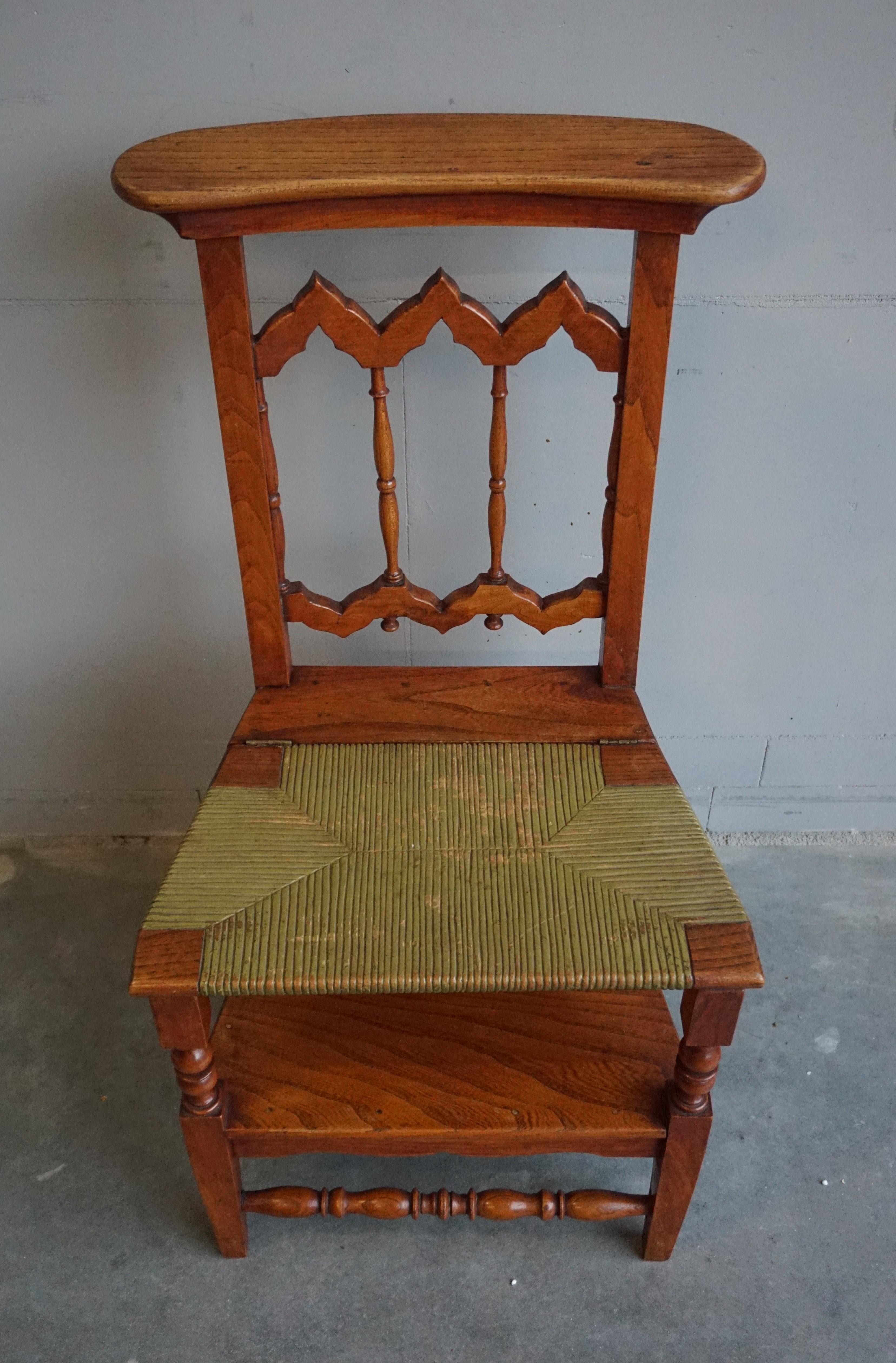 Finest quality crafted, Gothic Revival monks reading chair.

If you are looking for a stylish chair and a small library step into one then this handcrafted specimen could be perfect for you. This rare antique is made of solid elmwood only. This