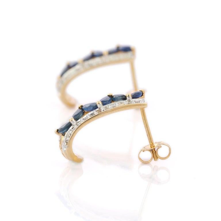 Clous d'oreilles uniques en or jaune 14 carats avec saphirs bleus et diamants, fabriqués à la main en vente 1