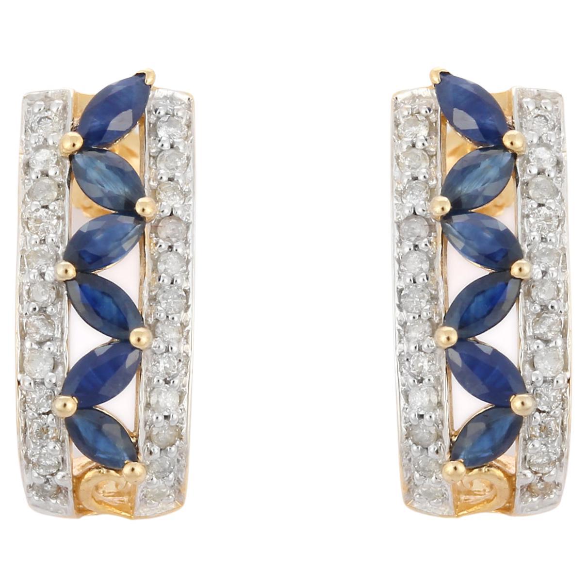 Clous d'oreilles uniques en or jaune 14 carats avec saphirs bleus et diamants, fabriqués à la main