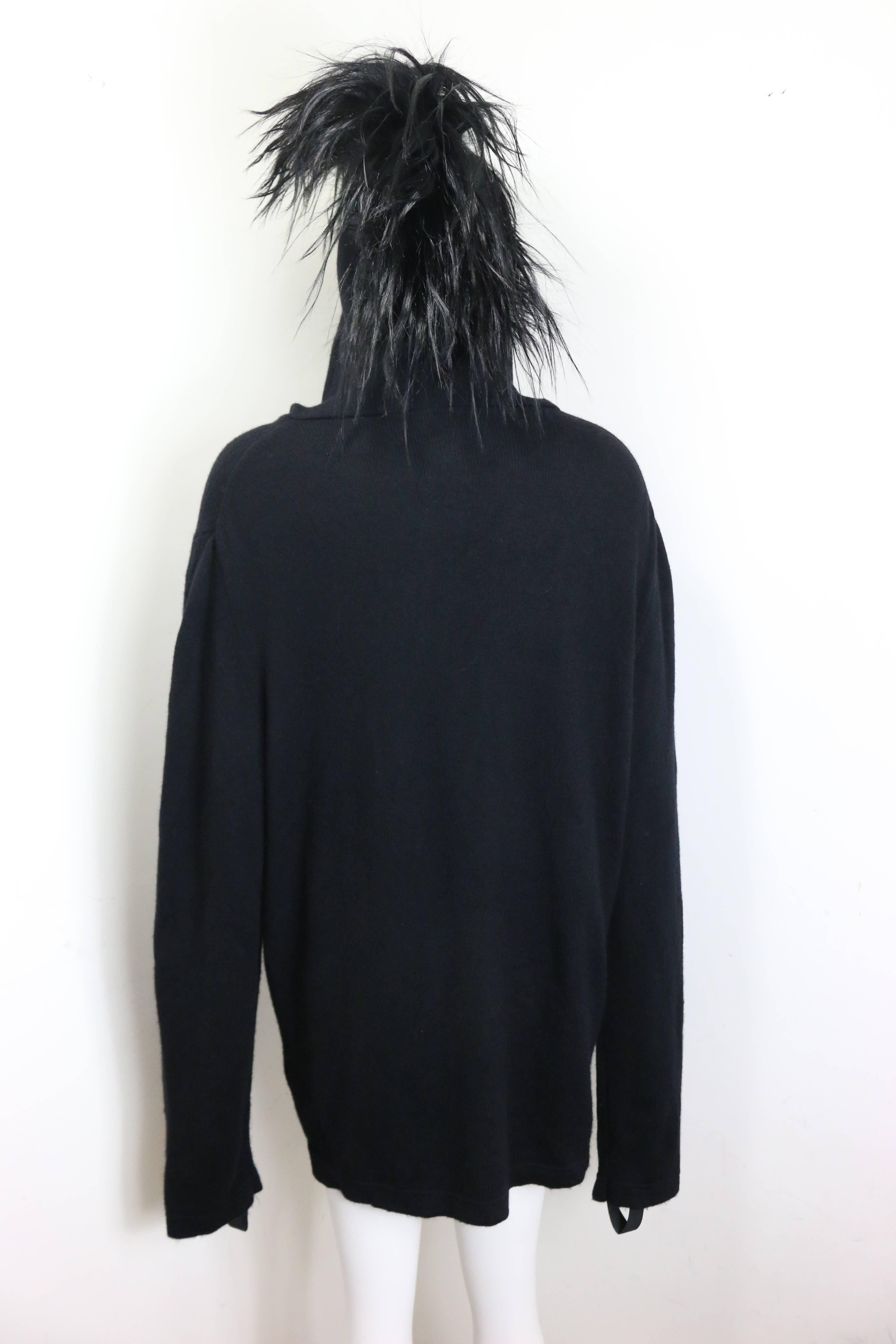 - Vintage Early 2000s Helmut Lang collection black wool hoodie. Featuring faux hair attached to the hoodie that you can style yourself. Also, a string attached to the hoodie and a fingers holes. It is such a fun and special piece of Helmet lang for