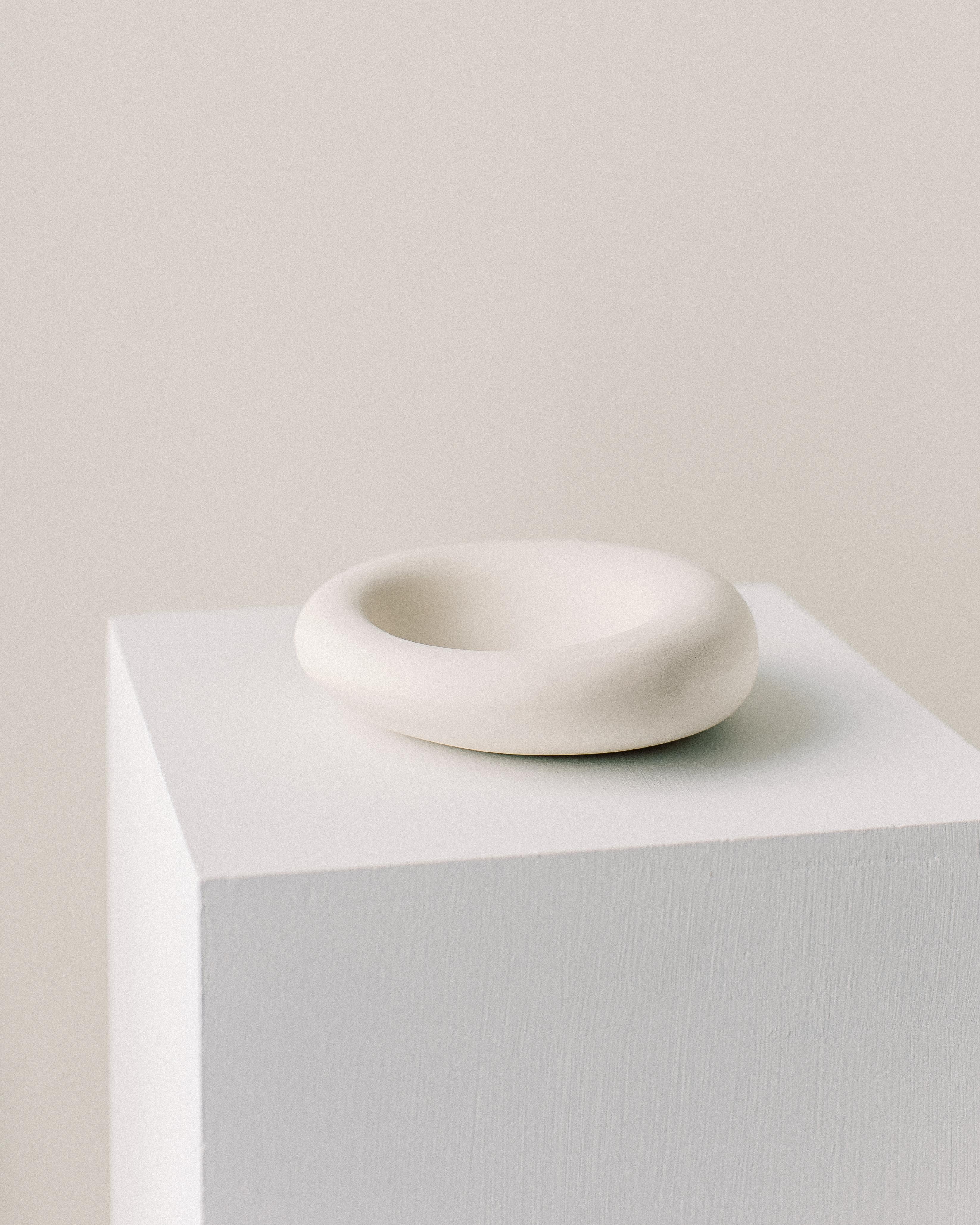 Unique heme form by Dust and Form
Dimensions: D 16.5 x 5 H cm
Materials: Porcelain

Origin Form Collection in three finishes: Hand-sanded (our Classic, smooth, bare finish) Ivory (satin white glaze) Charcoal (matte black glaze). Please contact