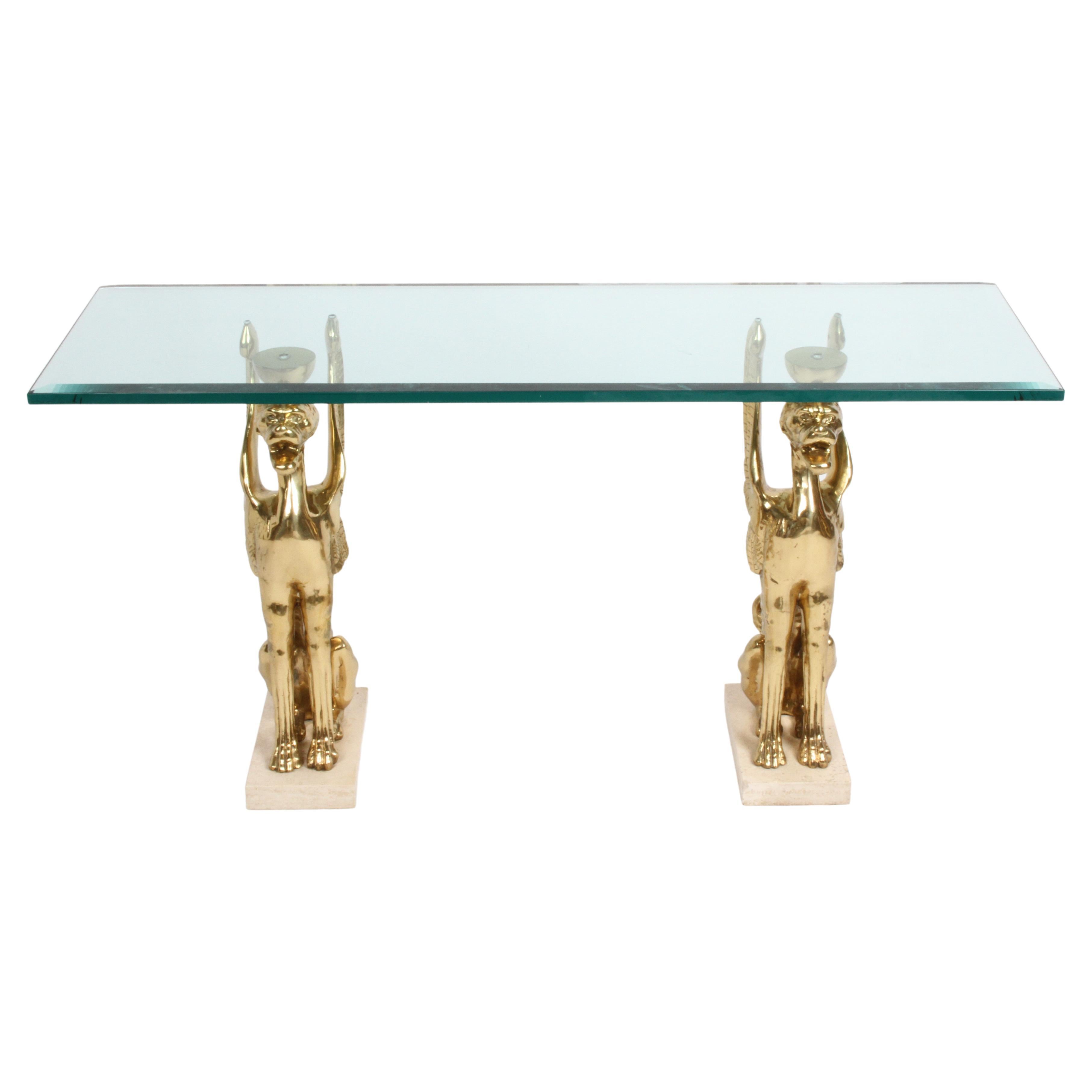 Console ou table d'entrée unique style Hollywood Regency en bronze stylisé avec griffons en verre
