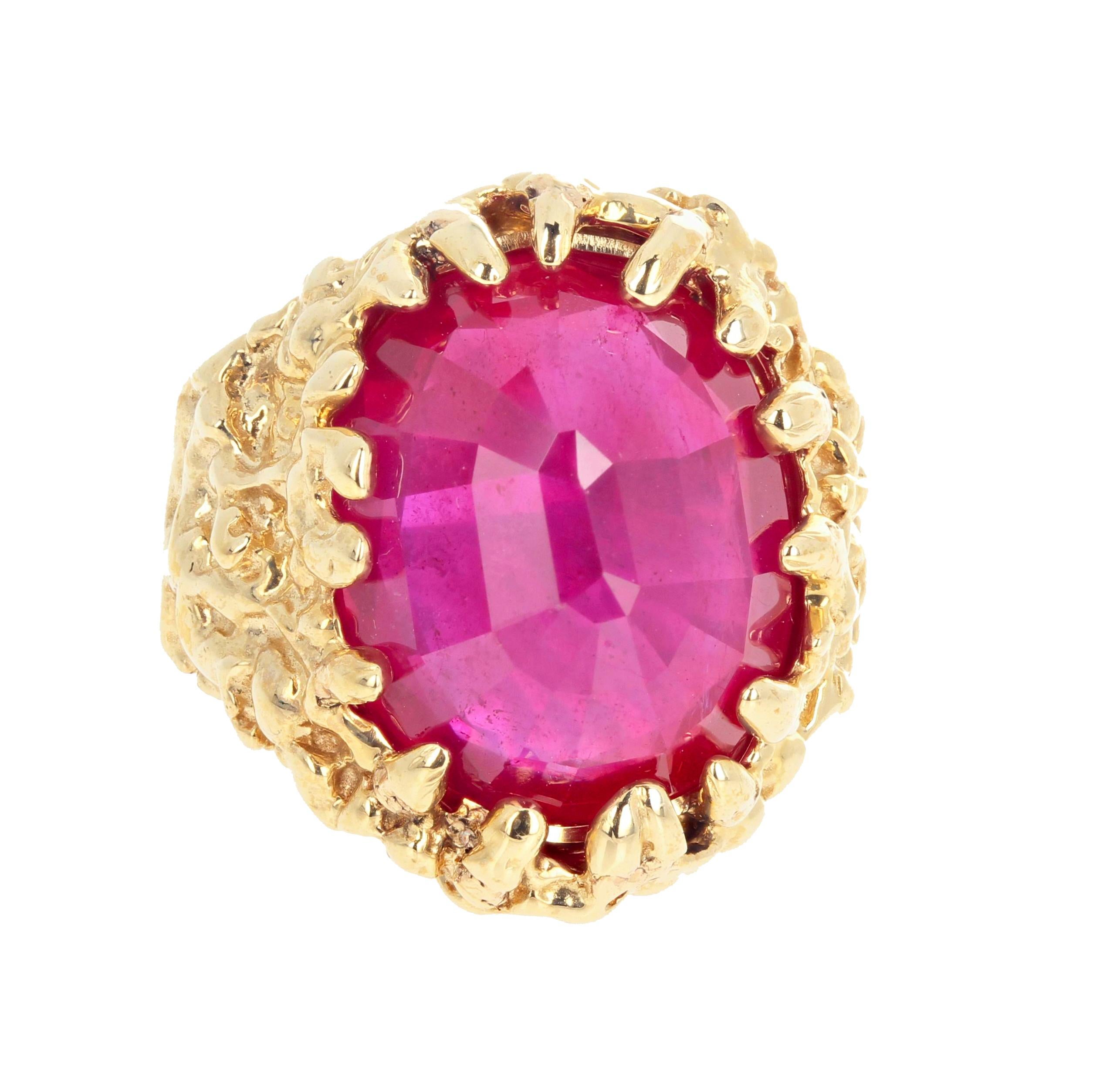 Glittering dramatic 14 carat red Ruby set upside down in this beautiful artistic unique 14Kt yellow gold ring size 7 (sizable for free).  The gemstone measures approximately 17mm x 12.80mm.  There are no eye visible inclusion in the Ruby when you