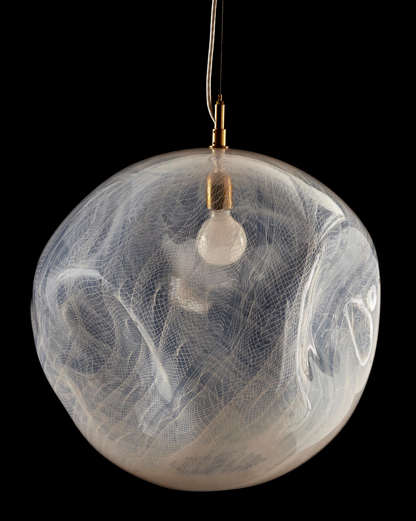 Unique illuminated sculptural pendant in hand blown filigree glass. Designed and made by Jeff Zimmerman and James Mongrain, USA, 2019.