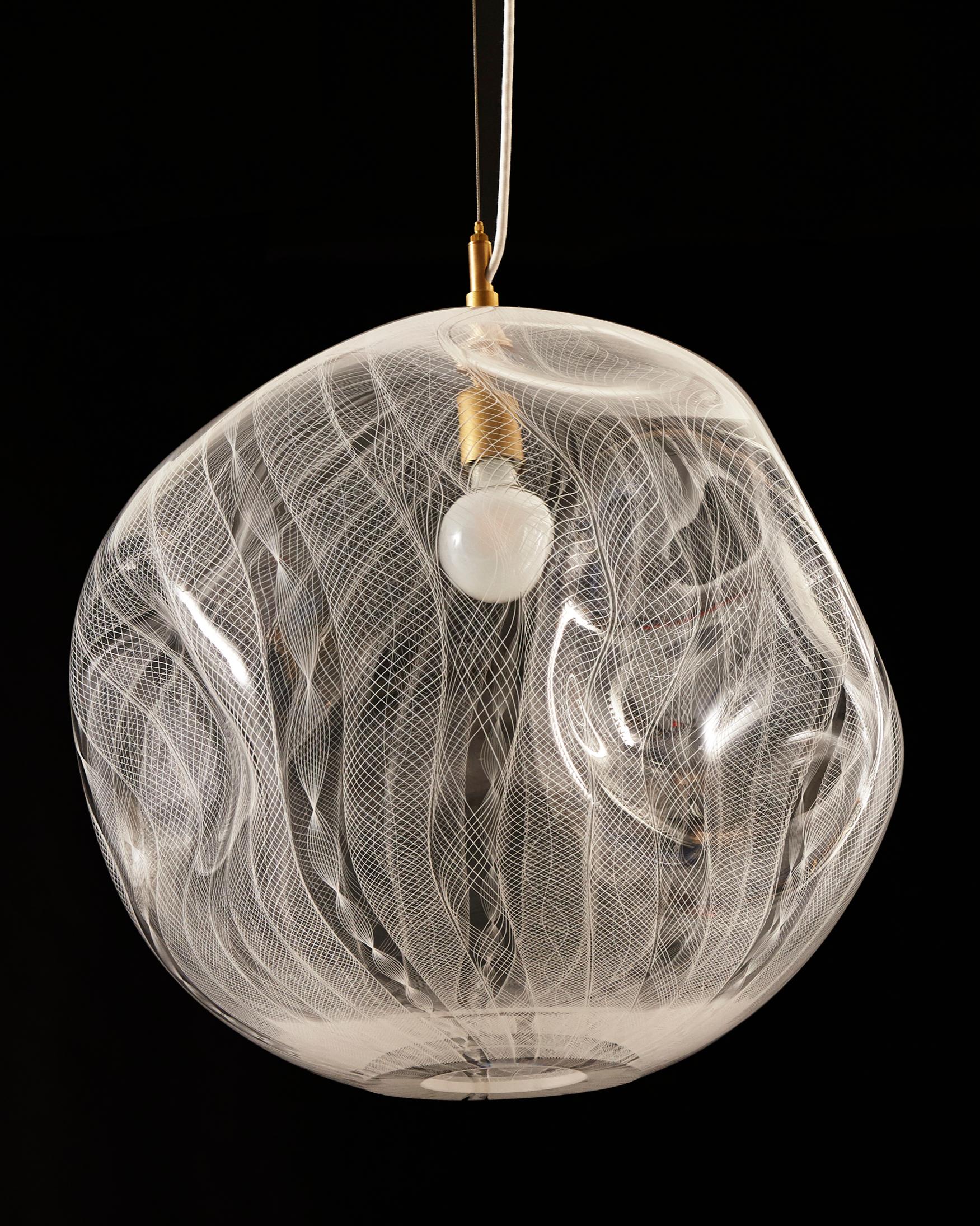 Unique illuminated sculptural pendant in hand blown filigree glass. Designed and made by Jeff Zimmerman and James Mongrain, USA, 2019.