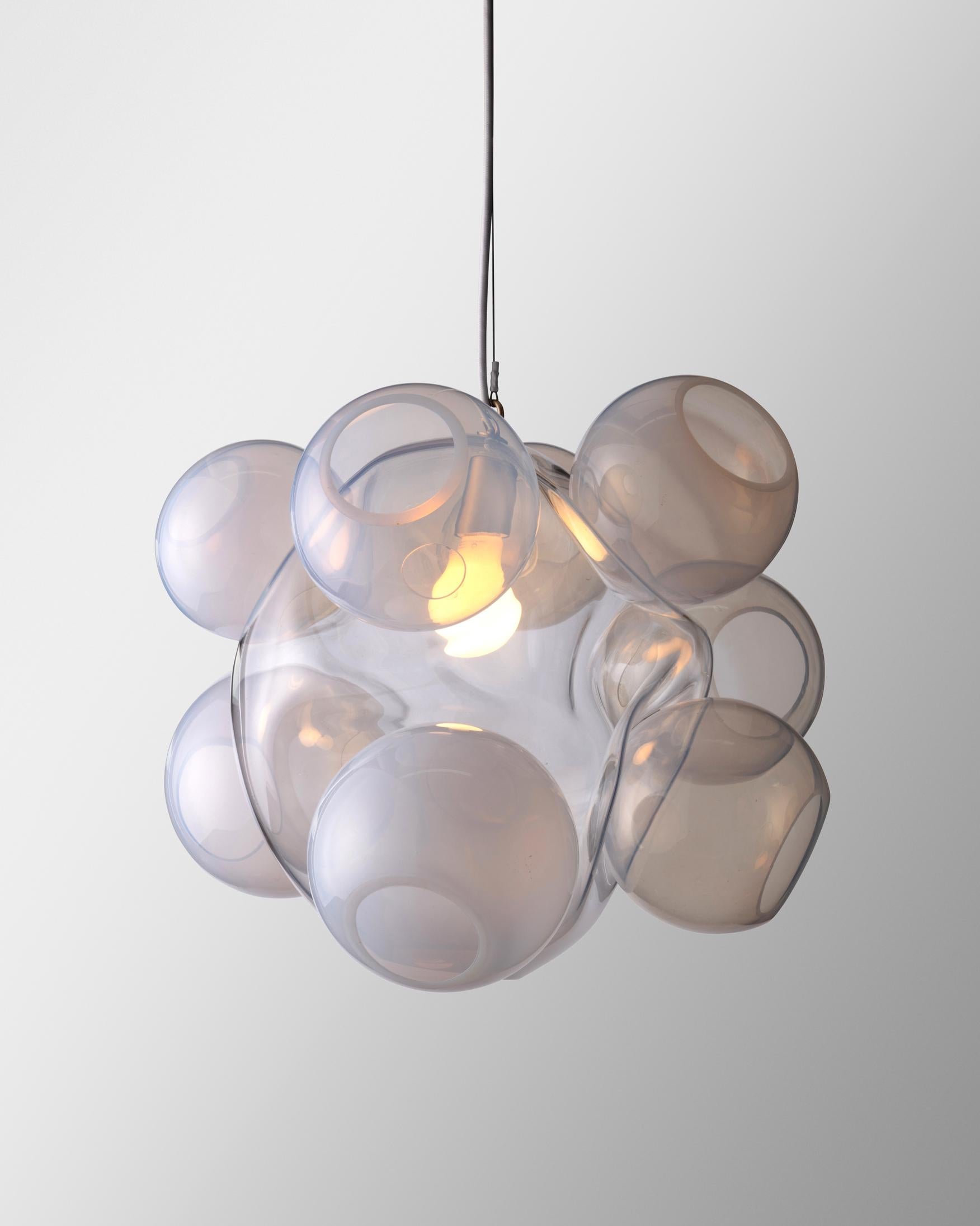 Unique illuminated sculptural pendant with translucent hand blown glass pearls. Designed and made by Jeff Zimmerman, USA, 2014.
 