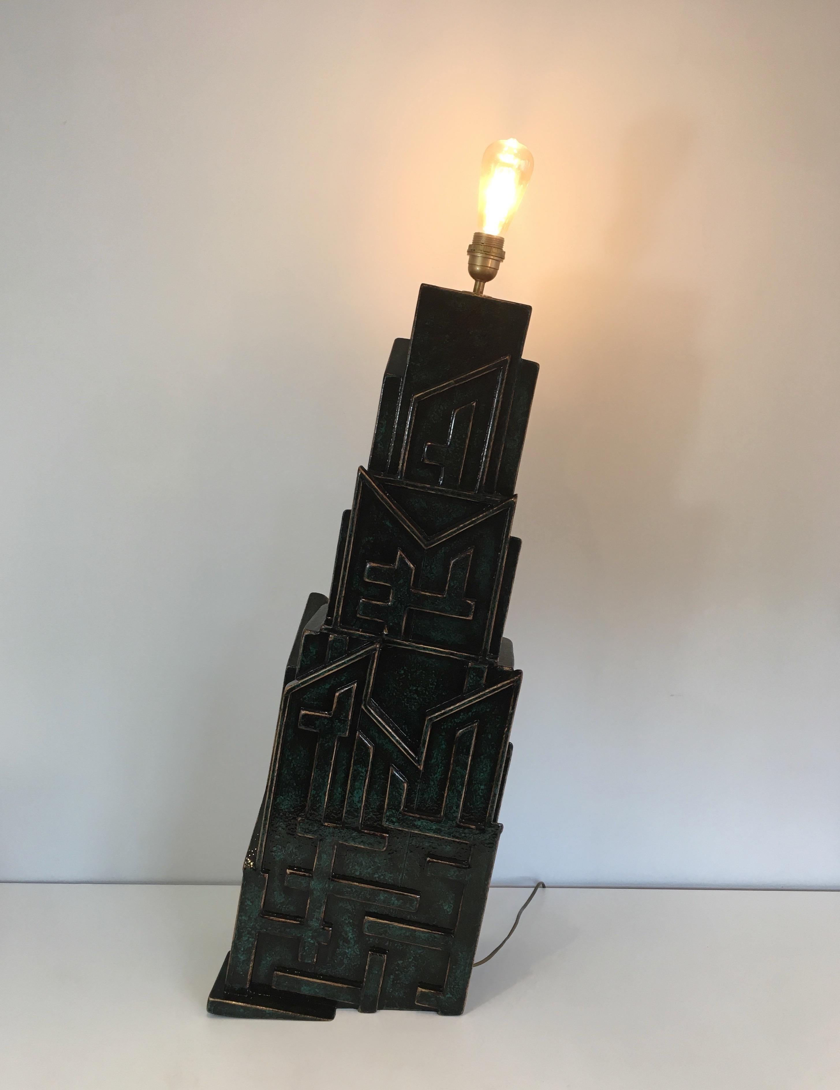 This unique important and very decoratoive brutalist lamp is made of carved and patinated wood. This is a very nice work of an amazing quality. This is a French work signed AR-BO. Circa 1990